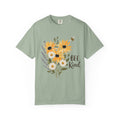 Muted green t-shirt with sunflower and lavender bouquet graphic and 'Bee Kind' text