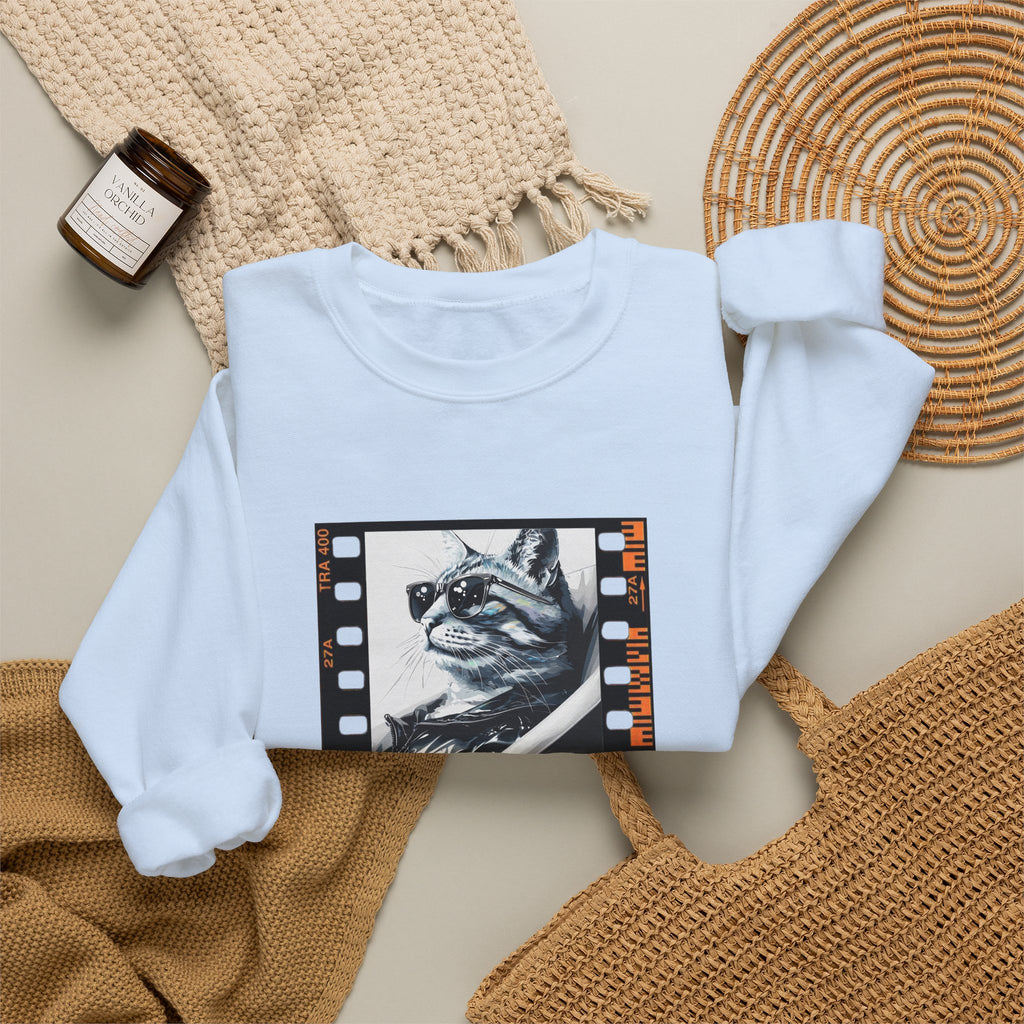 Light blue crewneck sweatshirt, centered cat graphic on front