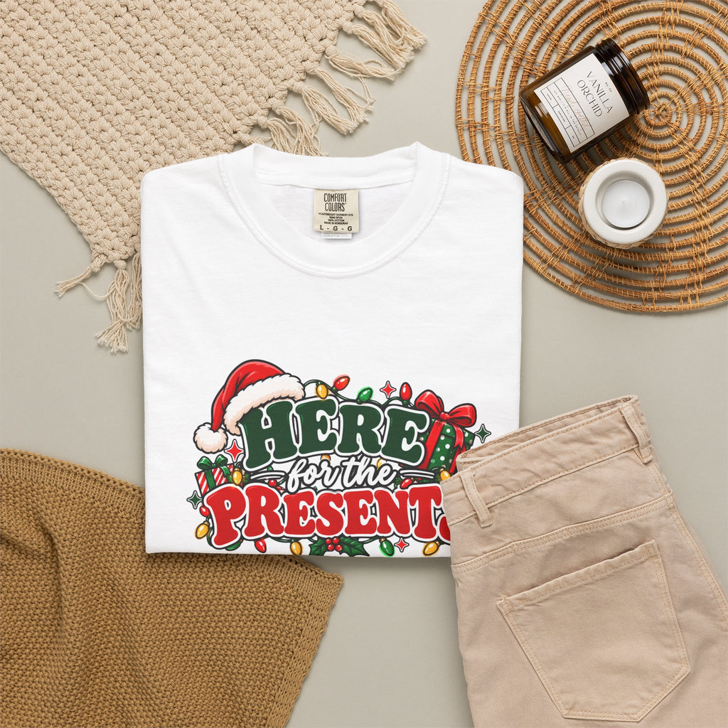 White Christmas T-shirt with 'Here for the Present(s)' holiday graphic centered on chest