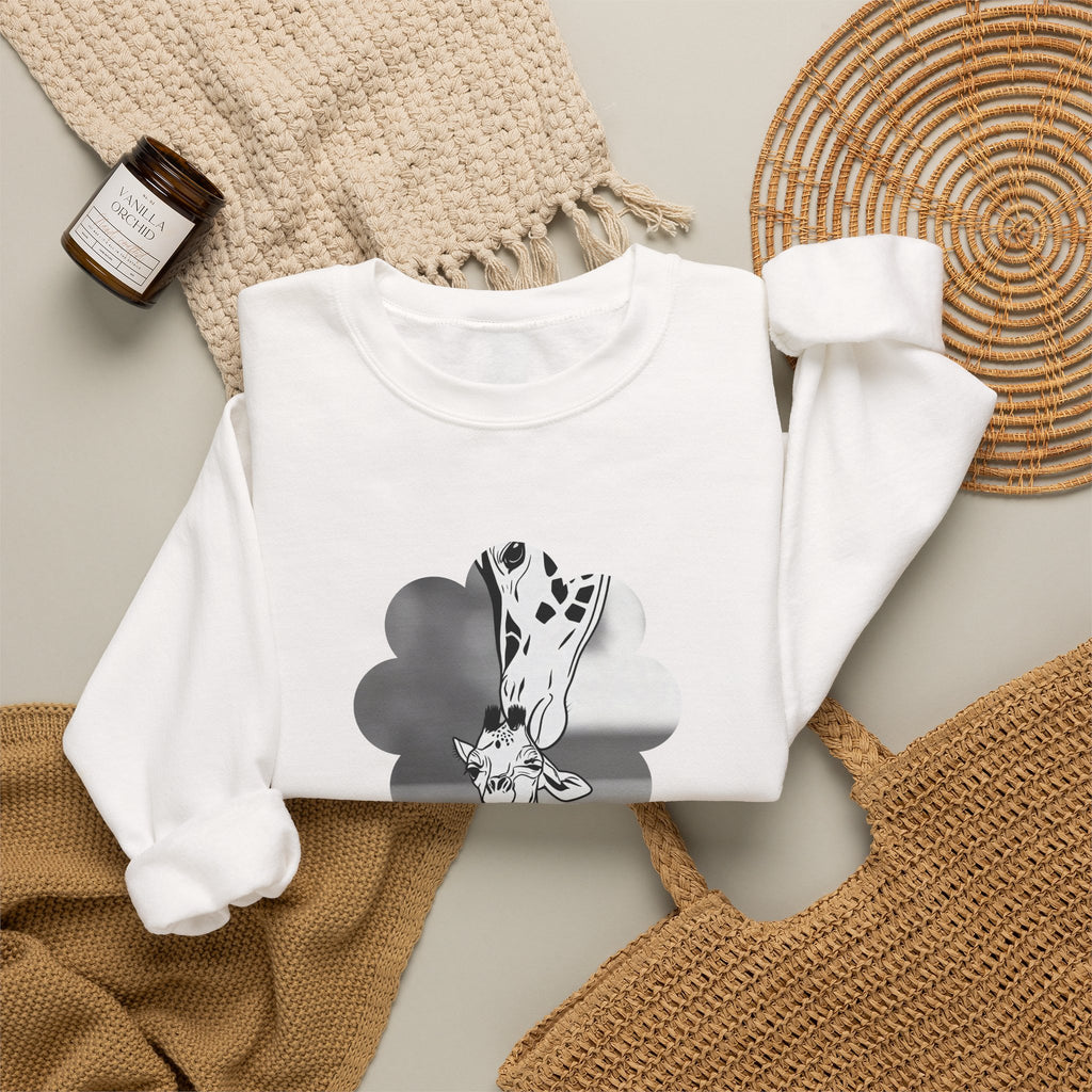White crewneck sweatshirt with black-and-white giraffe graphic on cloud shape