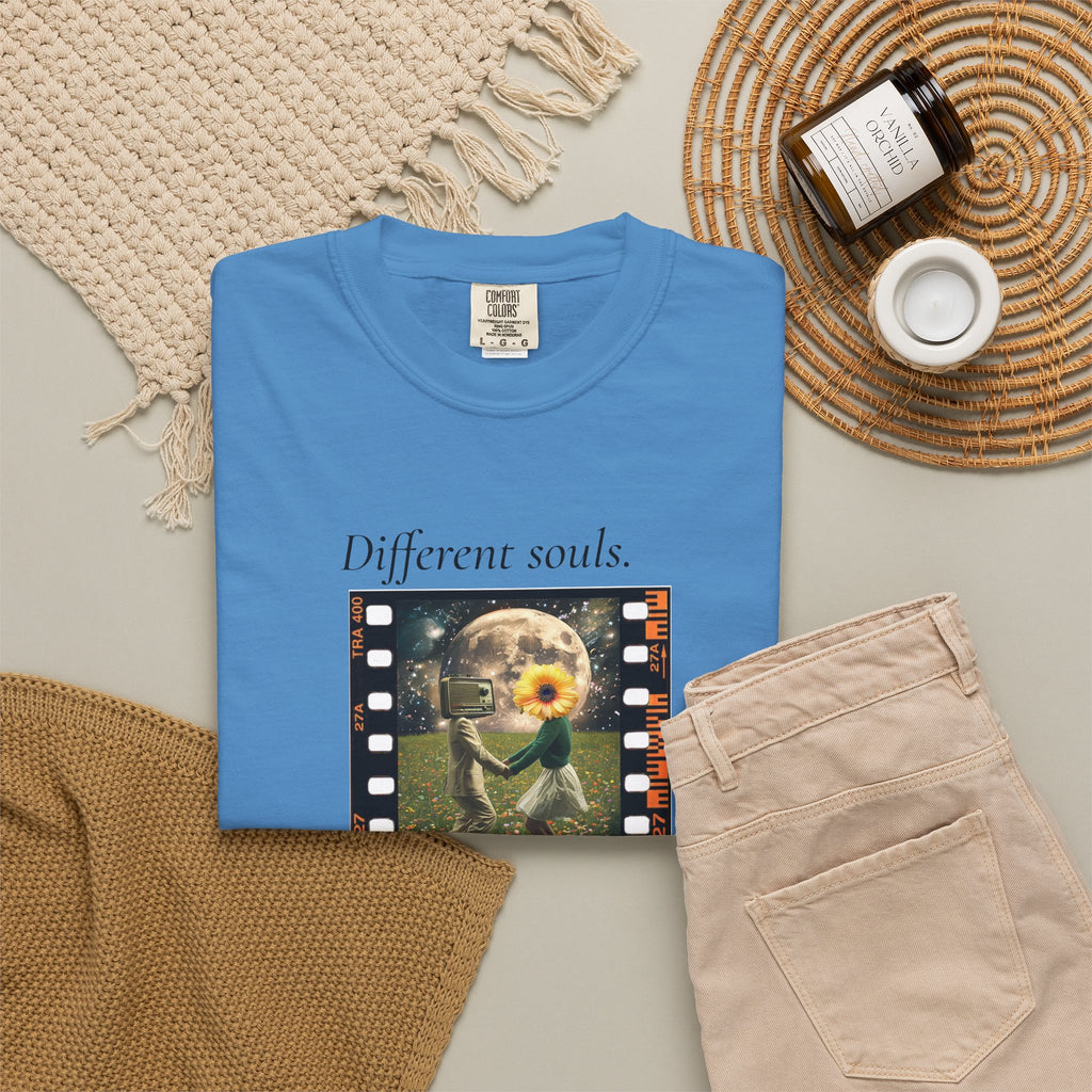 Blue crewneck graphic t-shirt with movie-frame art featuring flower and dancer