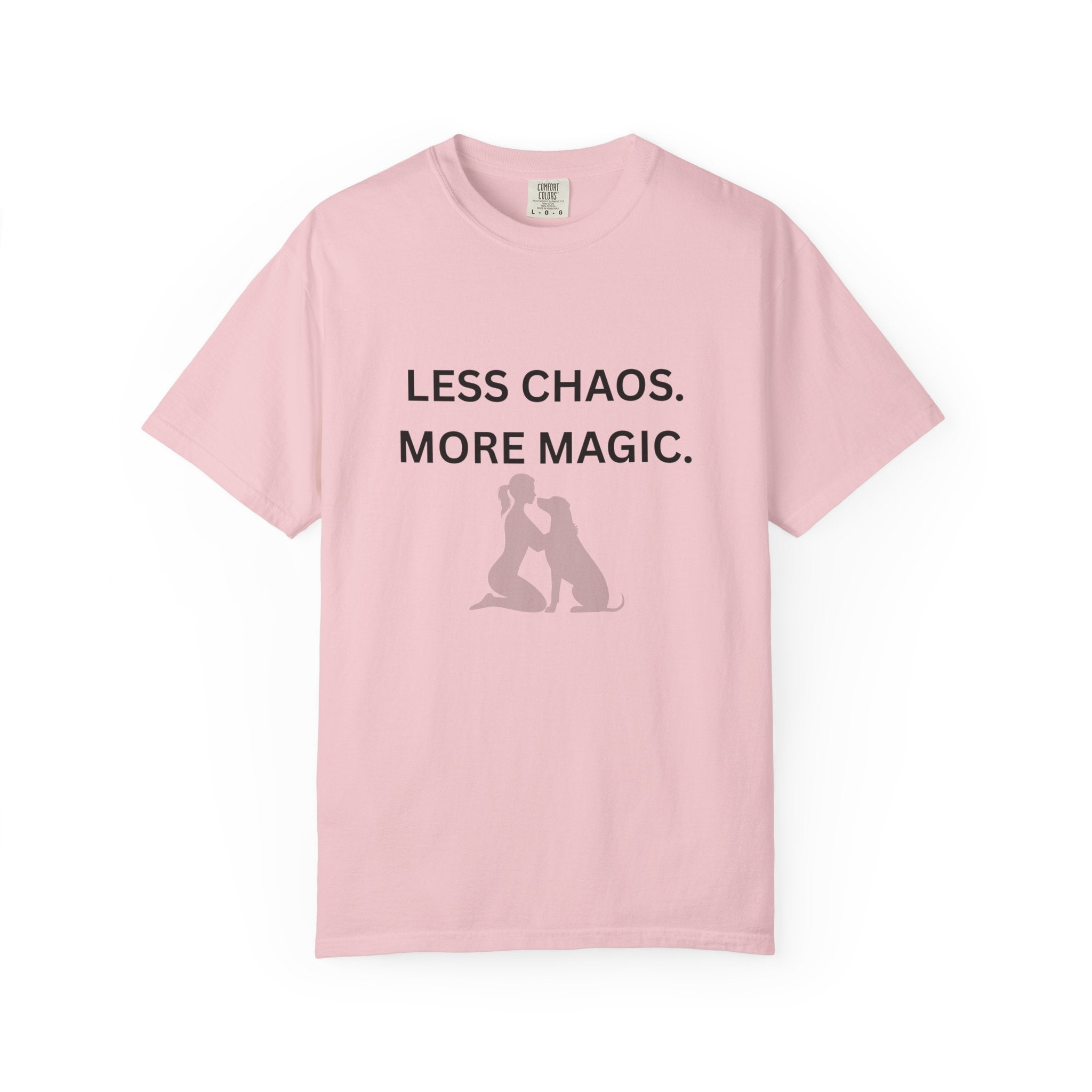 Women’s light pink T-shirt with “LESS CHAOS. MORE MAGIC.” text and dog silhouette graphic
