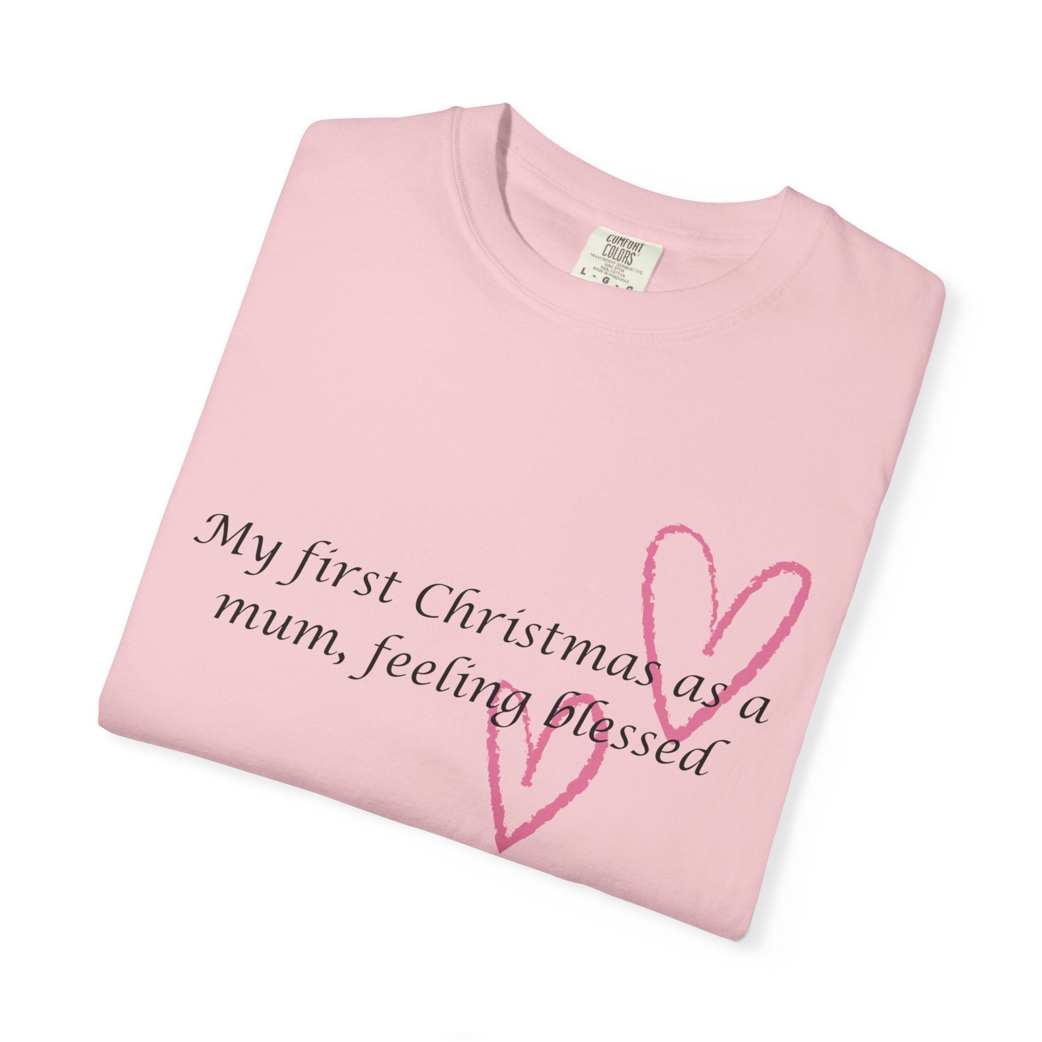 Light pink Christmas mum T-shirt with heart outline and message: “My first Christmas as a mum, feeling blessed”
