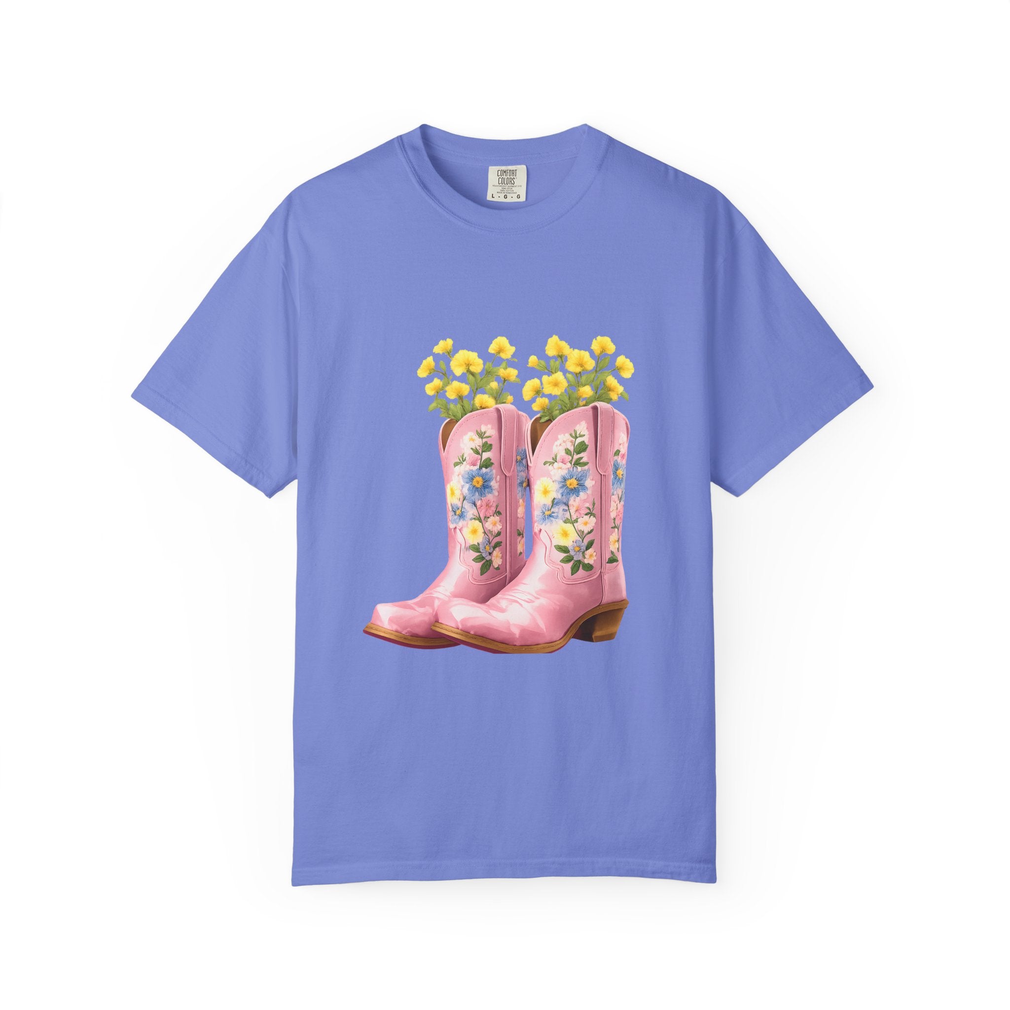 Periwinkle crew-neck T-shirt with floral cowboy boot graphic and yellow flower bouquet.