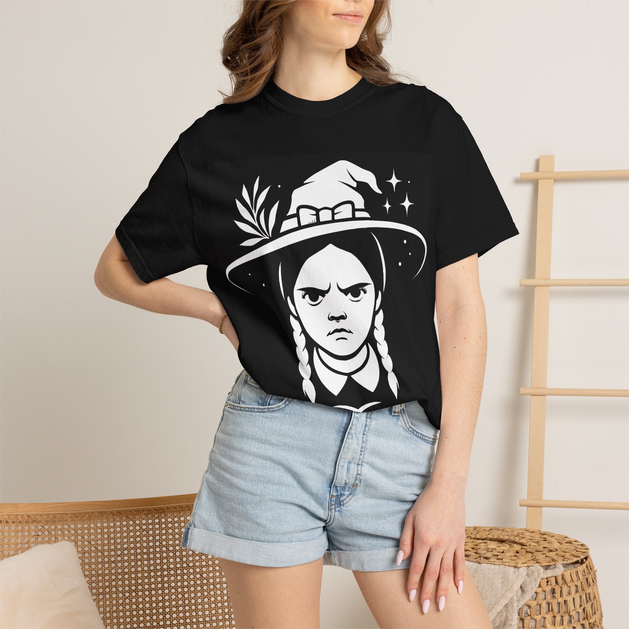 Black crewneck T-shirt worn with large white witch portrait graphic