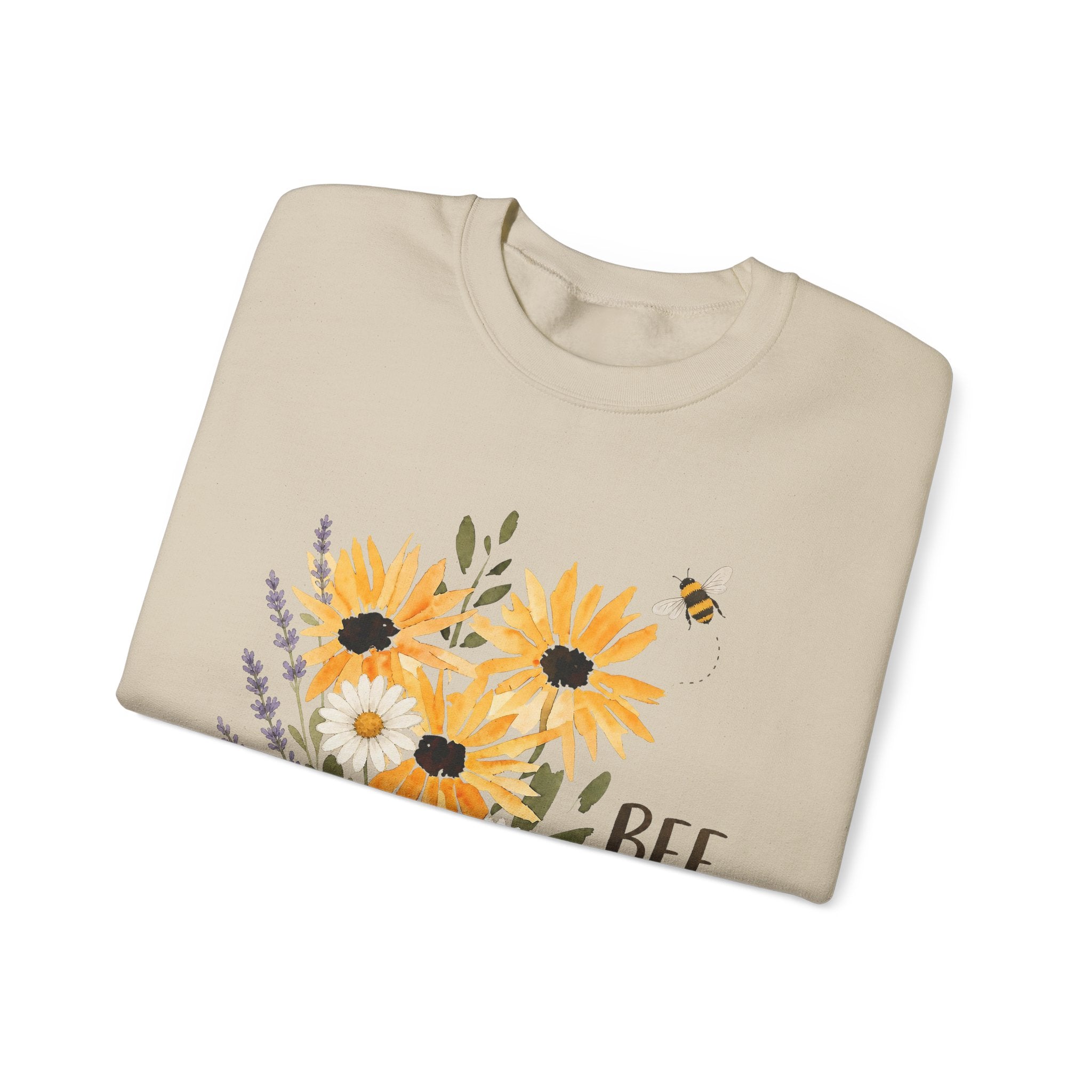 Sand crewneck sweatshirt with partial sunflower bouquet and 'Bee' text on front