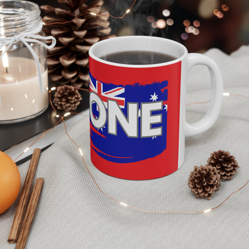Red ceramic coffee mug with Australia unity flag map graphic, white handle