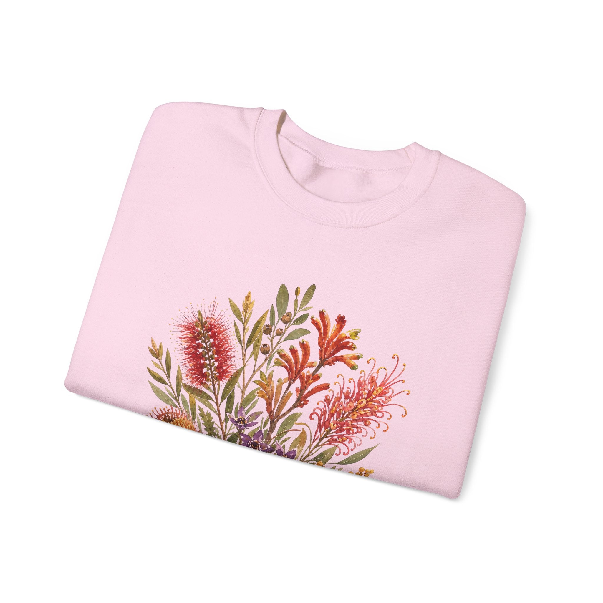 Light pink crewneck sweatshirt with floral bouquet graphic on front.