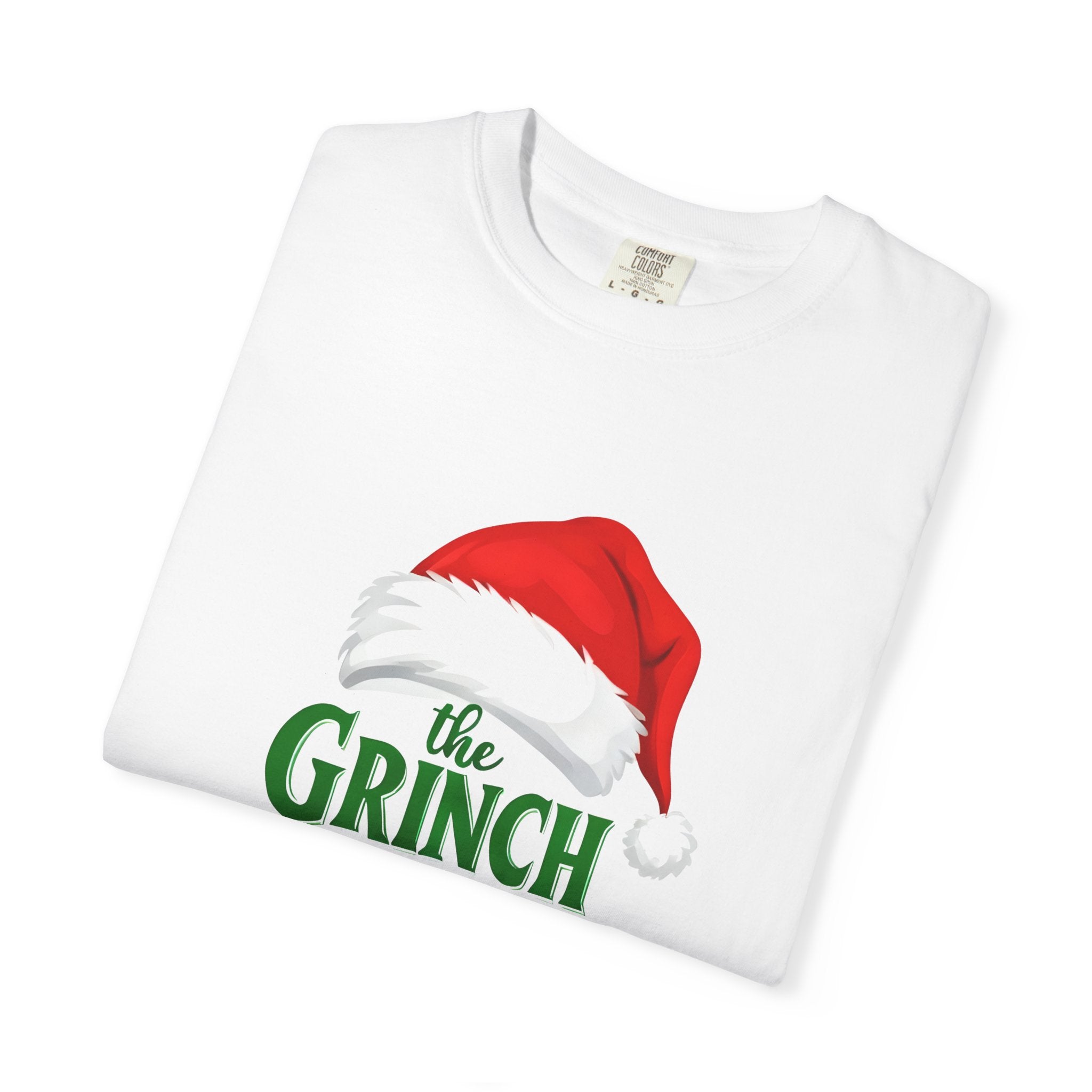 White T-shirt featuring a Grinch Santa hat graphic on the chest