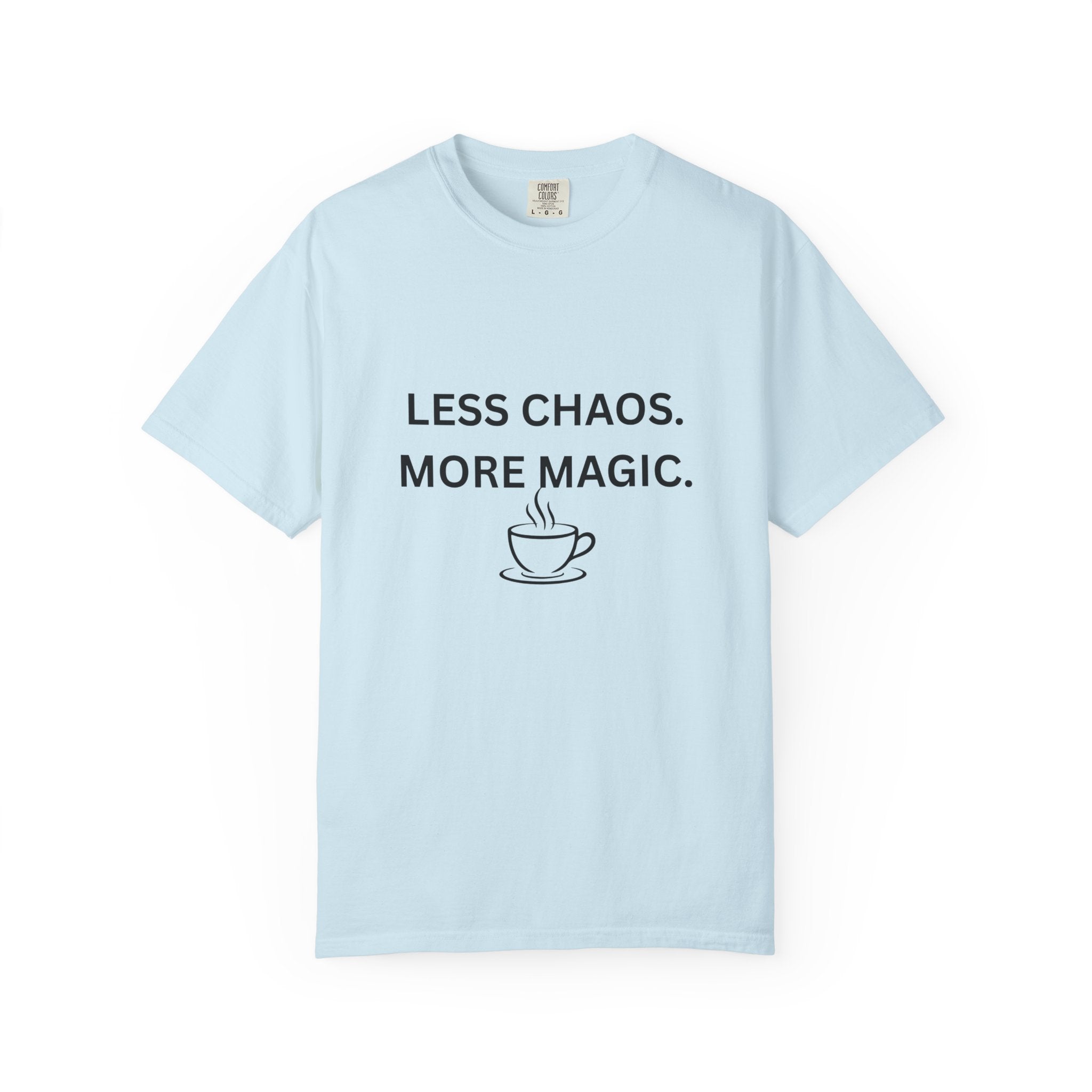 Light blue T-shirt with “LESS CHAOS. MORE MAGIC.” text and a coffee cup graphic