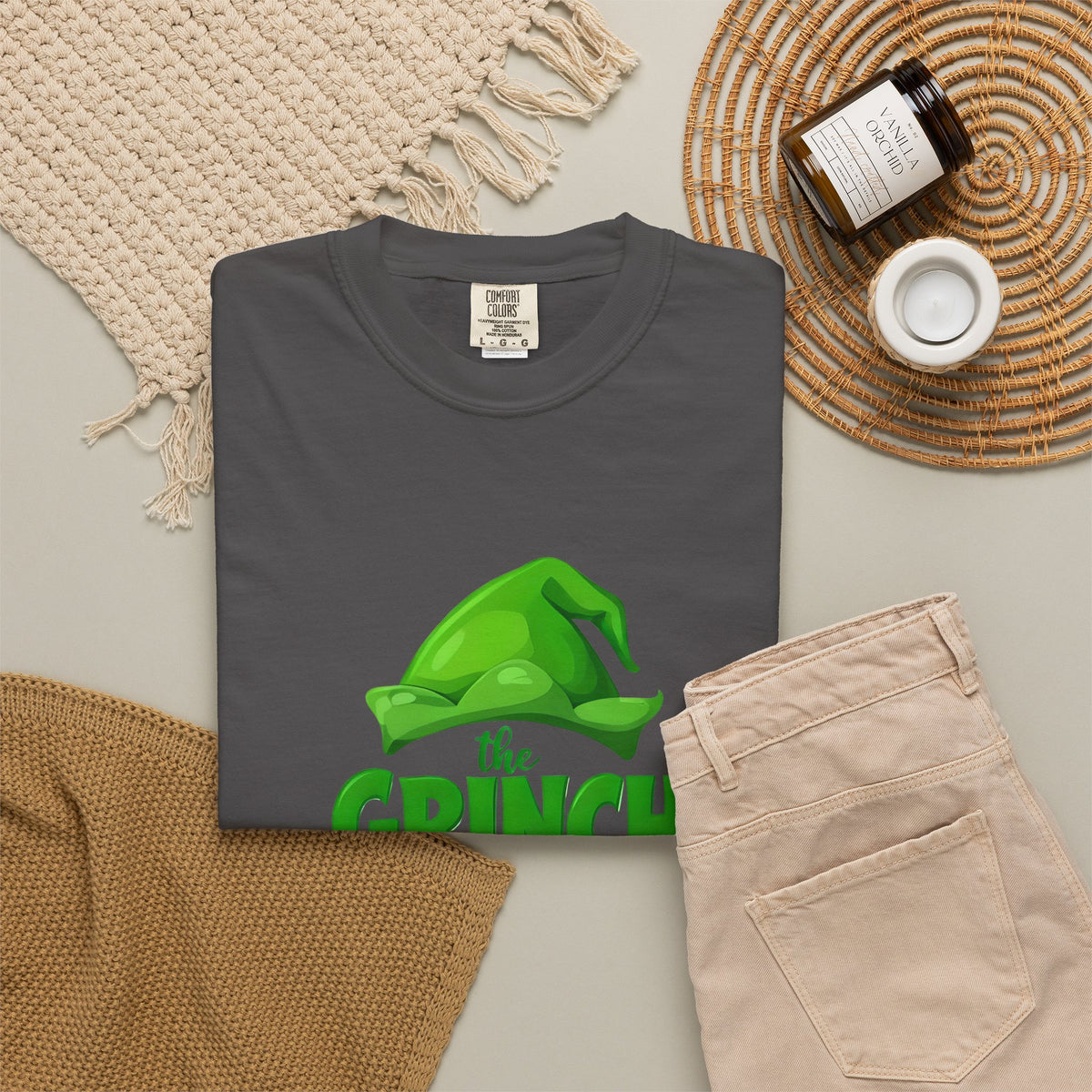 Dark gray unisex graphic T-shirt with green Grinch “the GRINCH made me do it” print