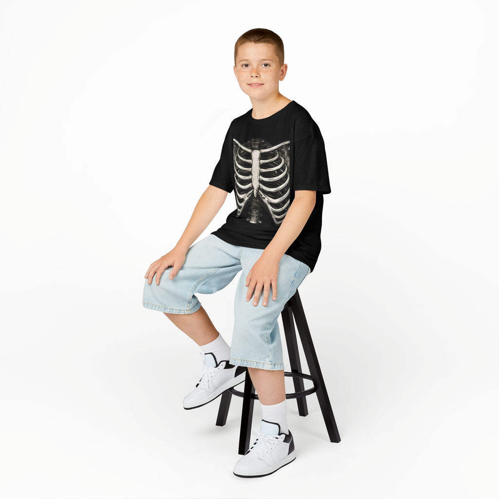 Kids black skeleton ribcage graphic t-shirt worn by a child, crew neck short sleeves