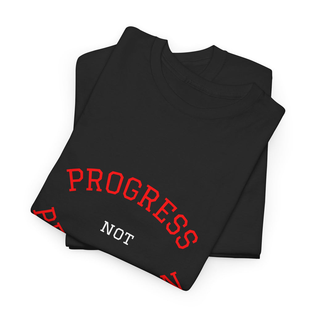 Black unisex cotton tees stacked with red "PROGRESS NOT PERFECTION" slogan