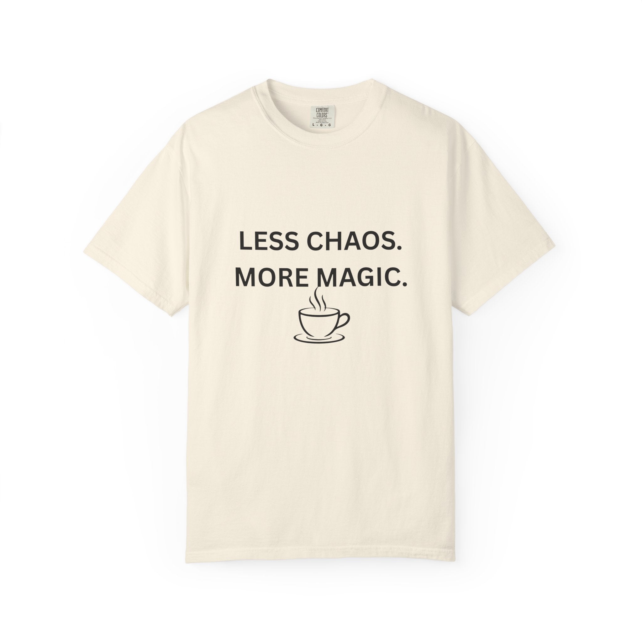 Cream T-shirt with “LESS CHAOS. MORE MAGIC.” text and a coffee cup graphic