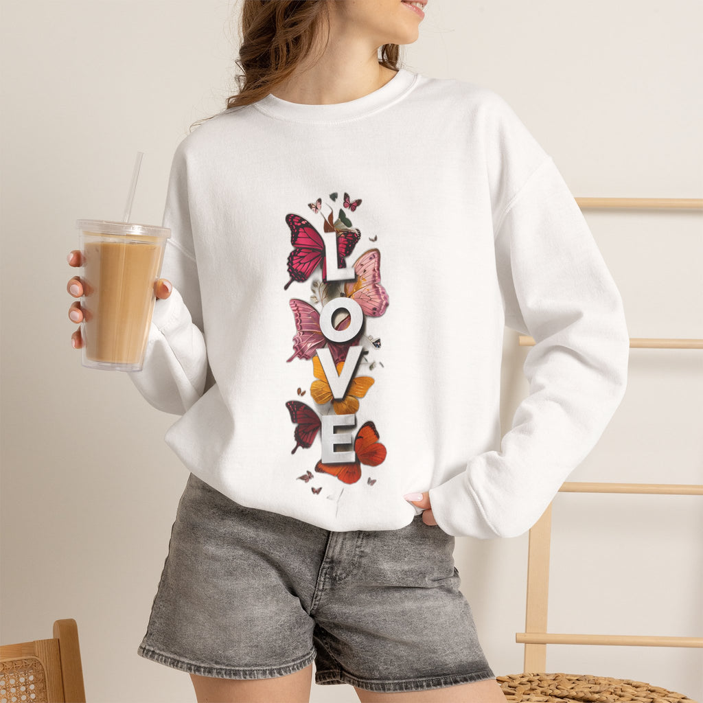 White crewneck sweatshirt with colorful butterfly “LOVE” graphic on front