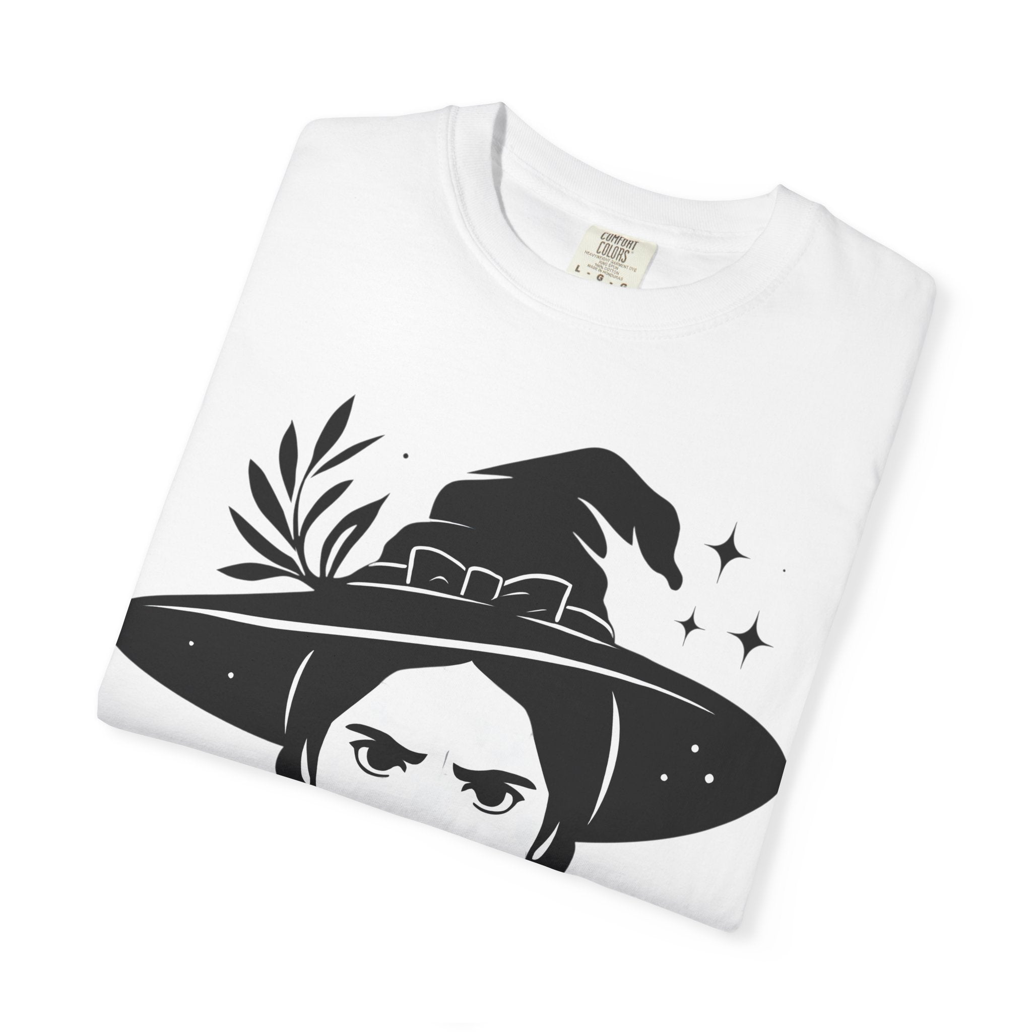White T-shirt laid flat featuring black witch hat and face illustration