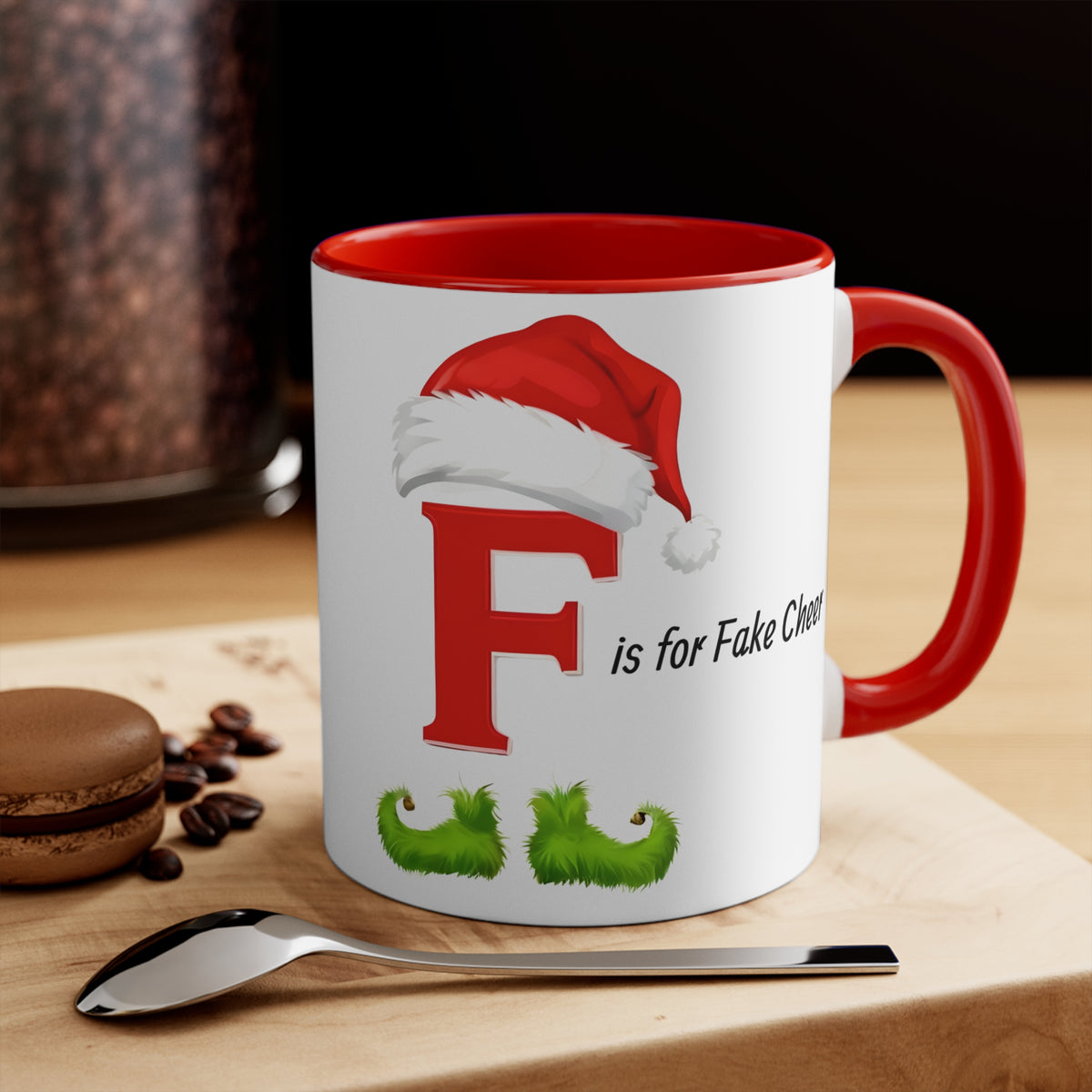 Christmas letter F mug, white with red rim and handle; Santa-hat F and “is for Fake Cheer” text