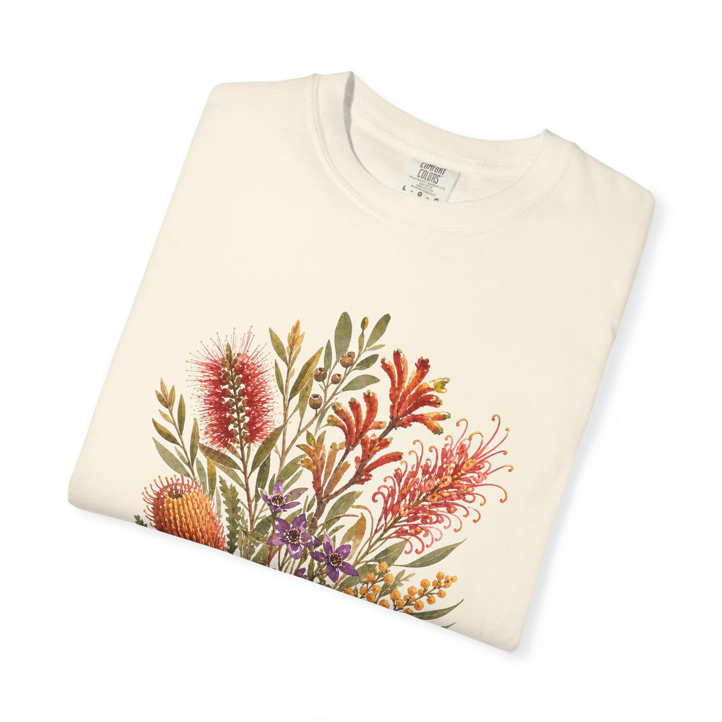 Ivory floral bouquet graphic t-shirt close-up with “Bloom Gently” text on chest.