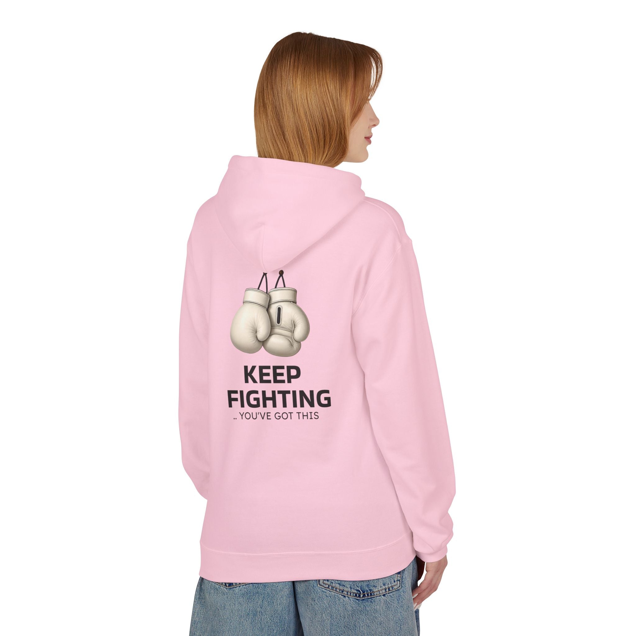 Pink pullover hoodie with back print: KEEP FIGHTING and boxing gloves graphic.