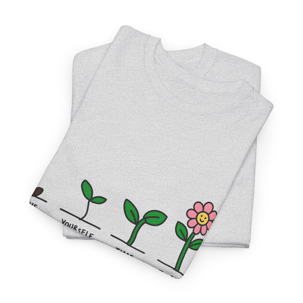 Light gray graphic t-shirt with green plant growth line and pink flower print on front