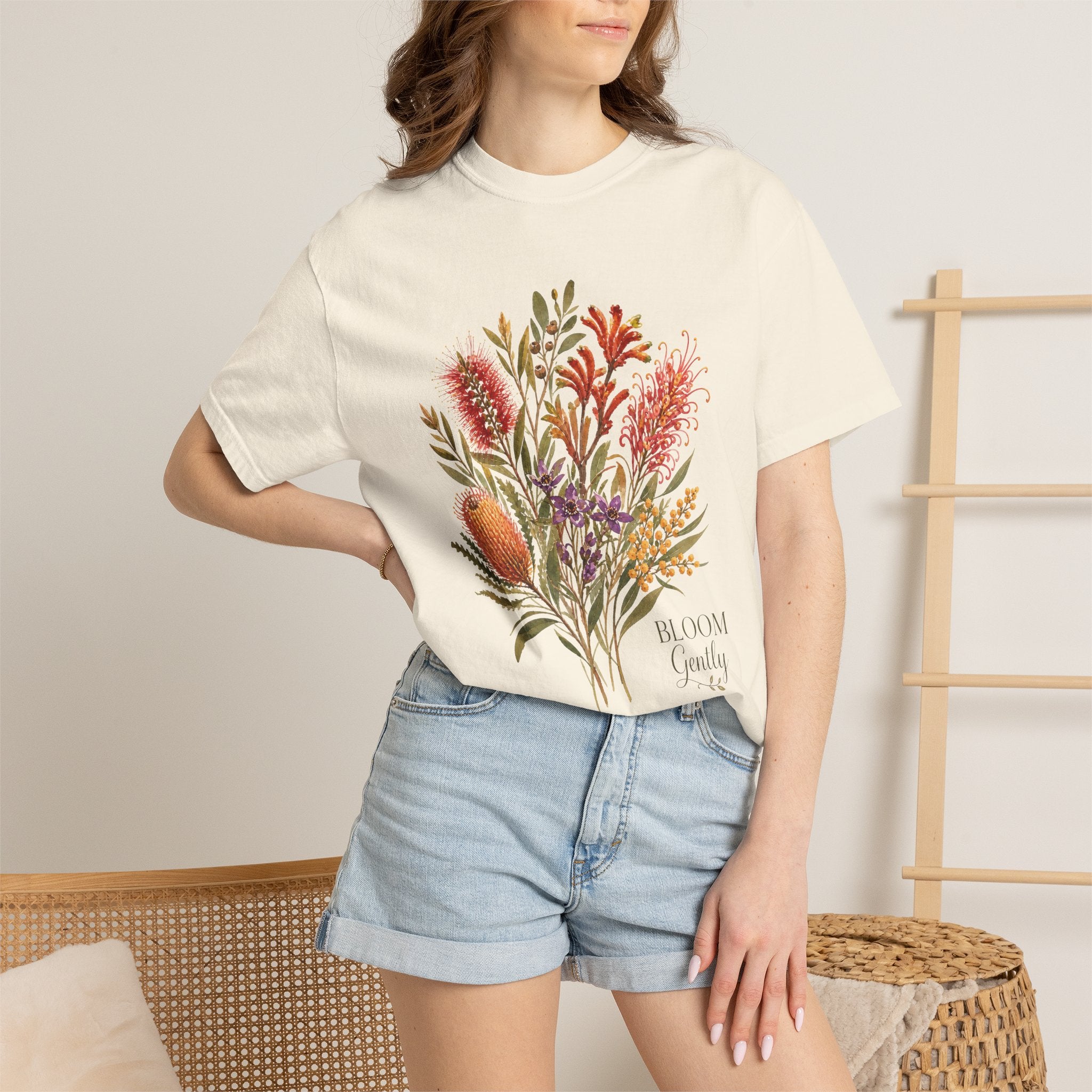 Ivory floral bouquet graphic t-shirt with “Bloom Gently” text on the chest.