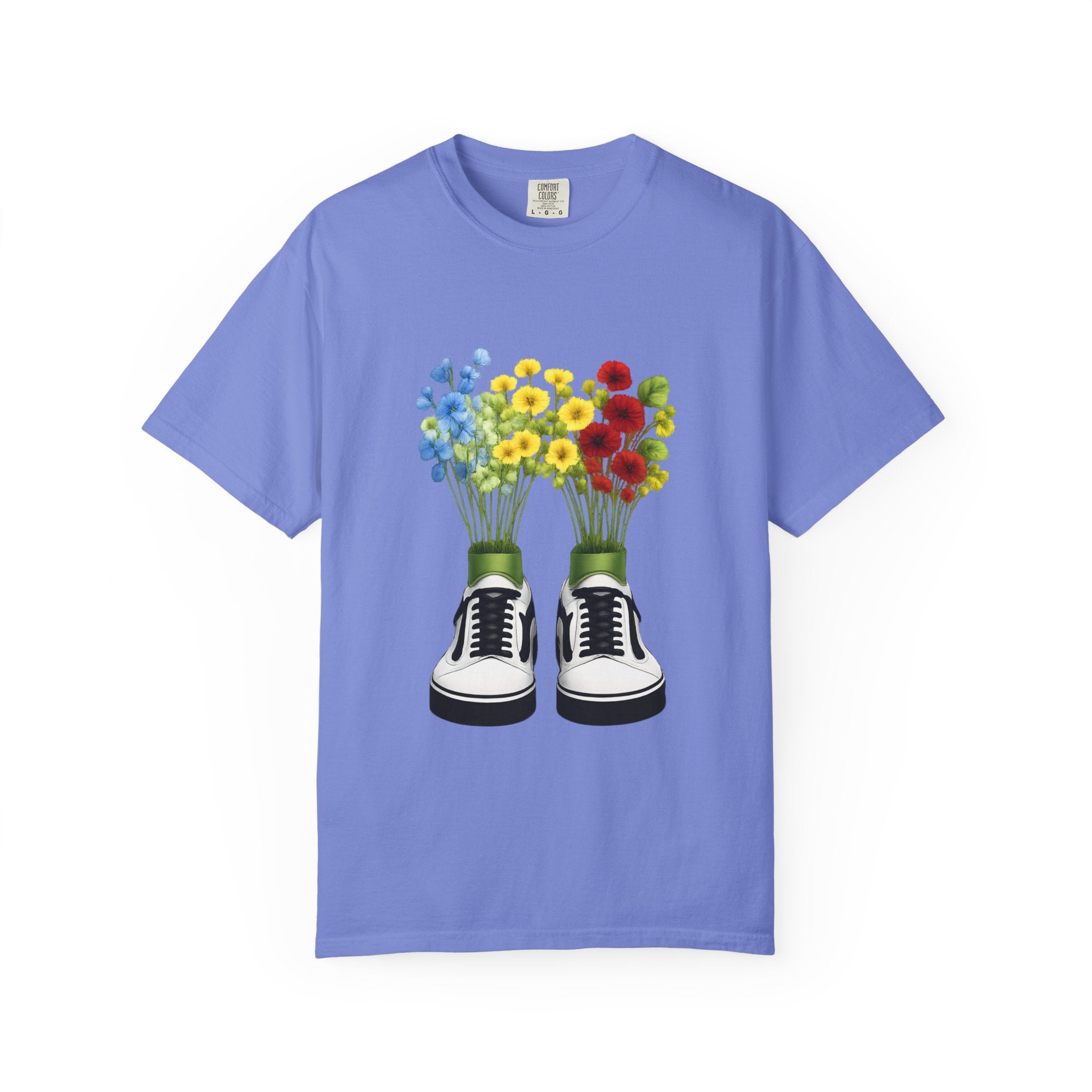 Light blue T-shirt with sneaker-and-flower bouquet graphic centered on the front