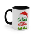 Black interior mug with white body, black handle, and Grinch holiday graphic