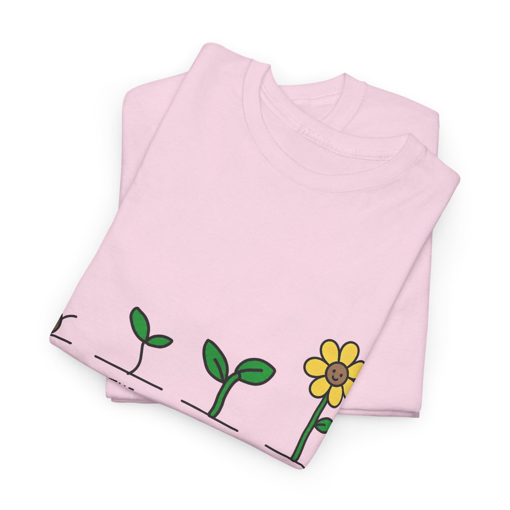 Pink crewneck T-shirt with green seedling stems and yellow flower graphic