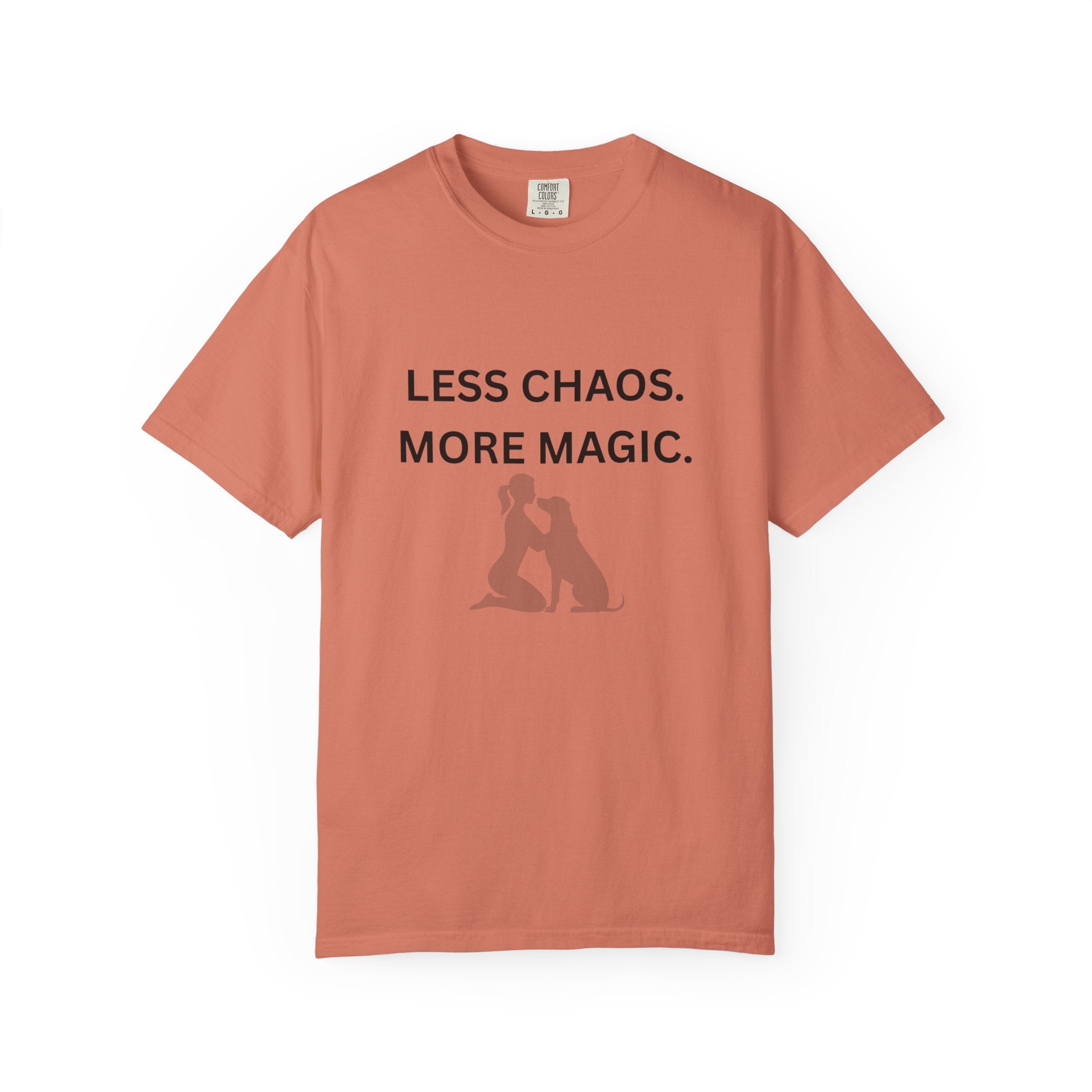 Terracotta crew-neck T-shirt with 'LESS CHAOS. MORE MAGIC.' text and woman-dog silhouette