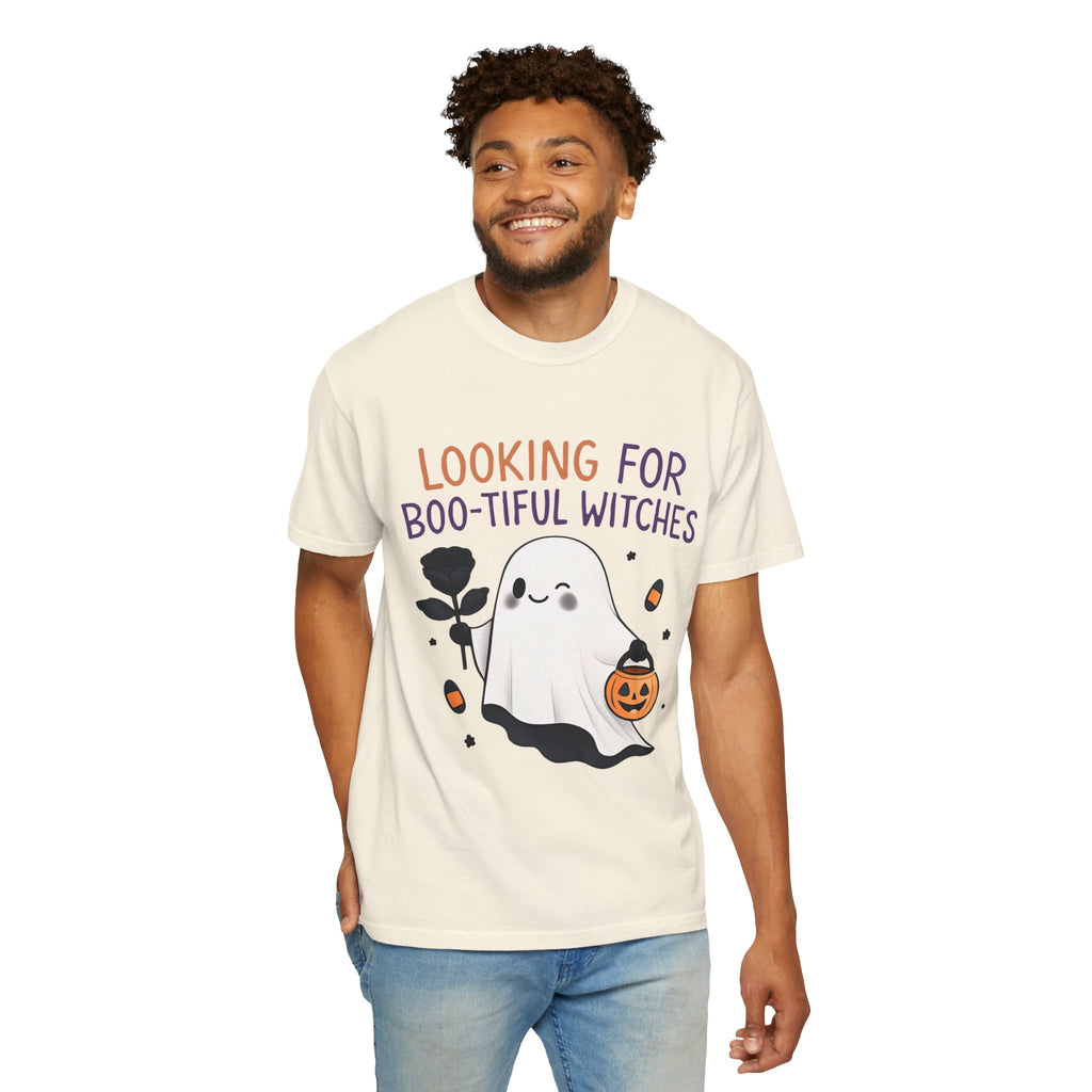 Ivory unisex graphic T-shirt on model with ghost witch holding pumpkin bucket