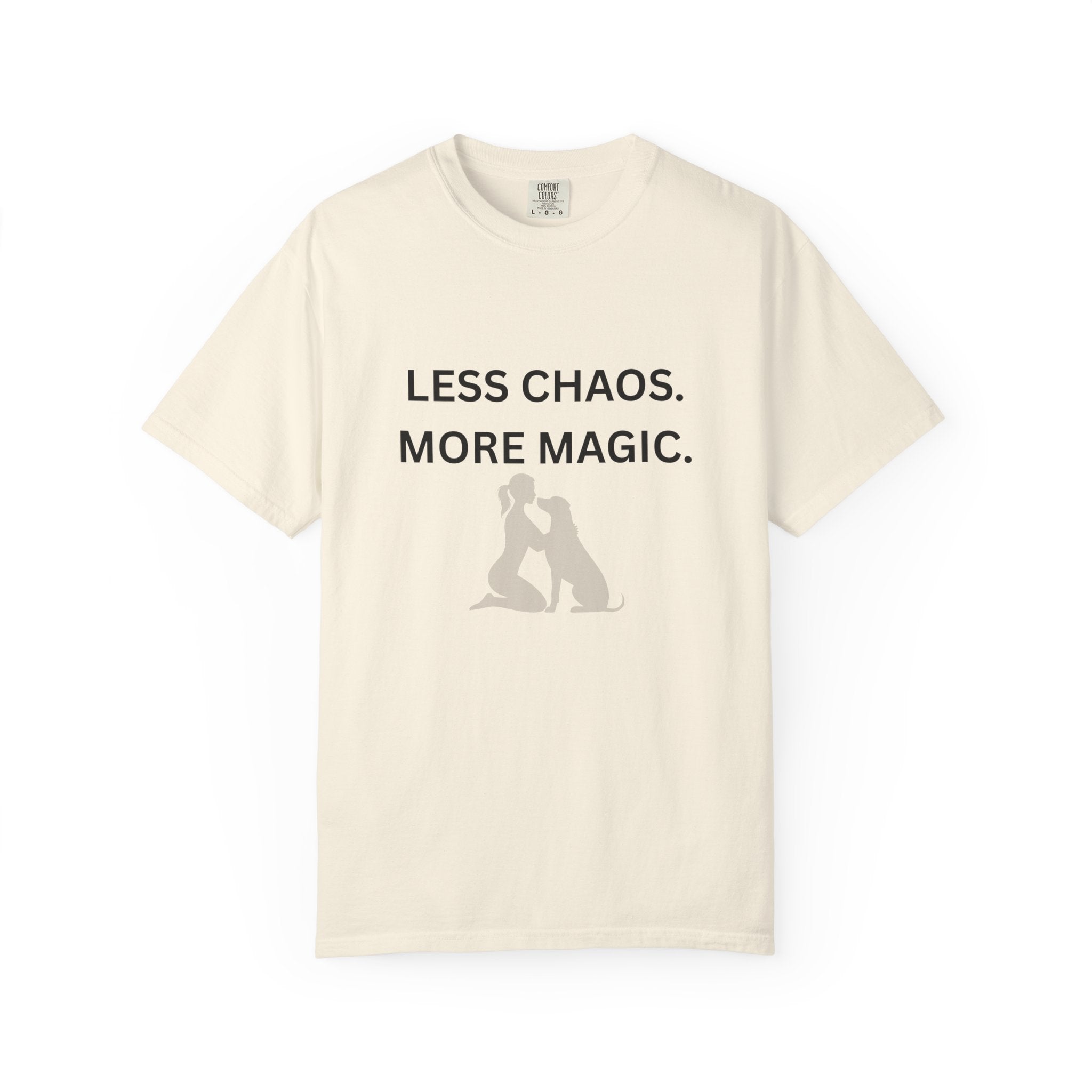 Ivory crew-neck T-shirt with 'LESS CHAOS. MORE MAGIC.' text and woman-dog silhouette