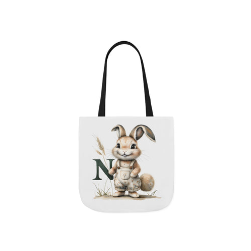 Black canvas tote bag with bunny holding letter N front print