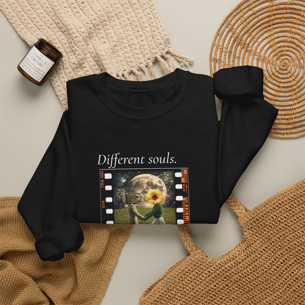 Black crewneck sweatshirt with “Different souls.” filmstrip graphic