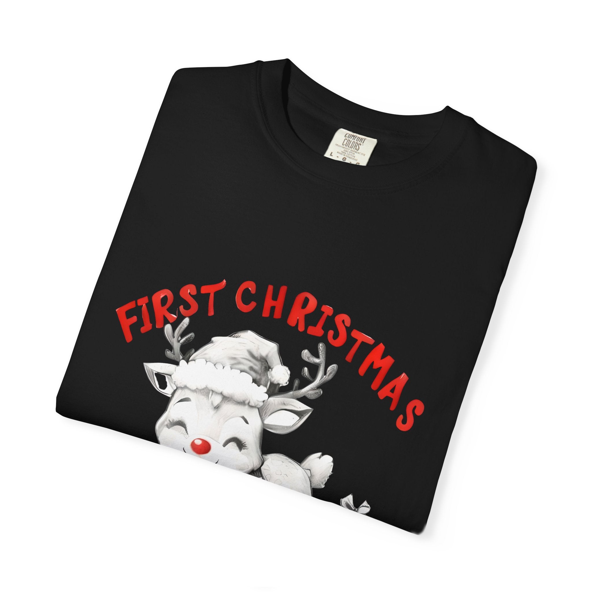 Black T-shirt close-up showing “First Christmas” reindeer and “MUMMA” graphic