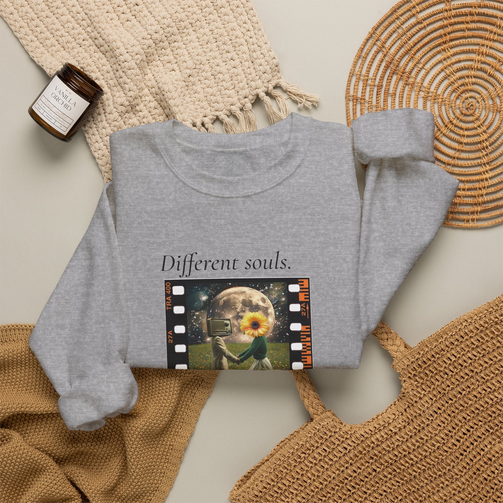 Heather gray crewneck sweatshirt with long sleeves and front filmstrip-style graphic