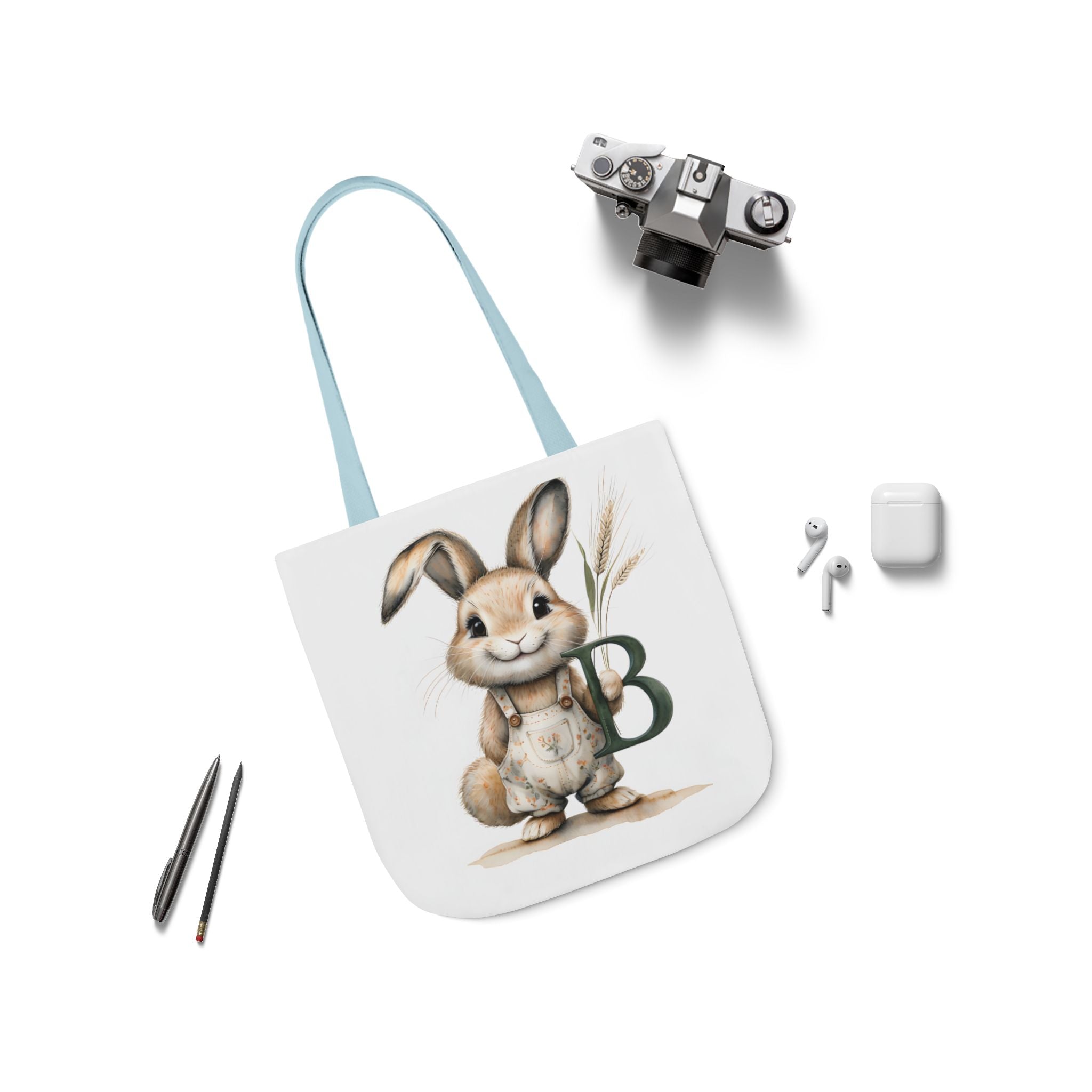 Bunny canvas tote bag with light blue strap, rabbit graphic on white front panel