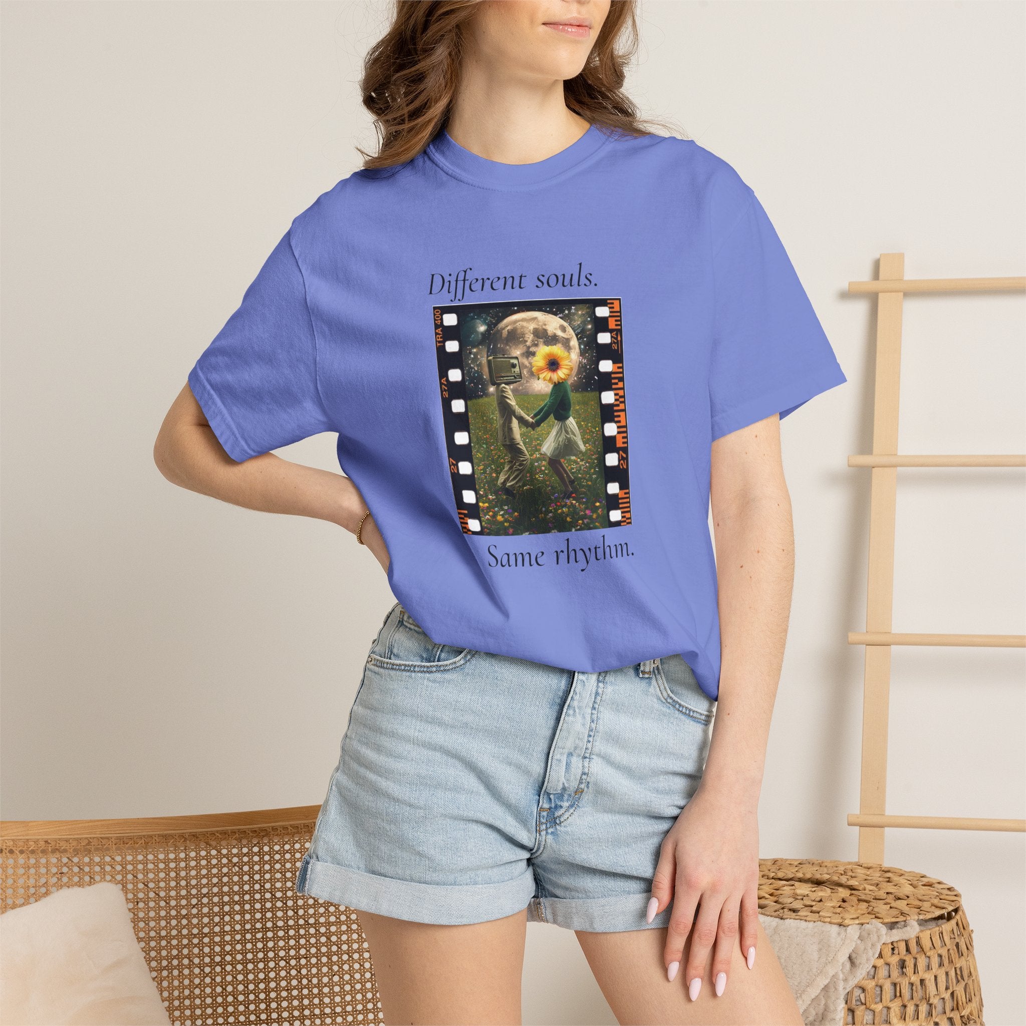 Purple crew-neck graphic t-shirt worn by model with “Different souls” print