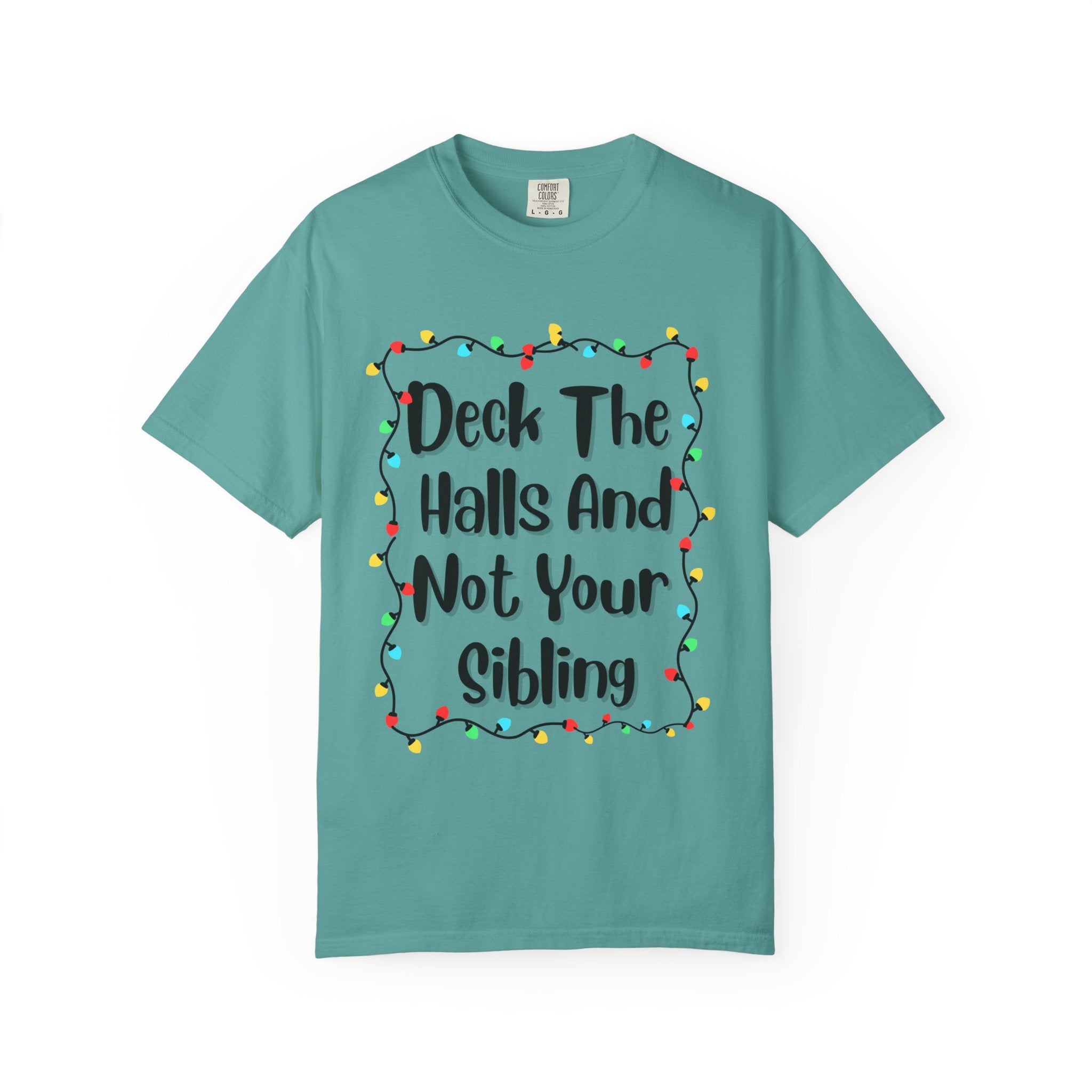 Seafoam green T-shirt with colorful holiday lights frame and funny text graphic