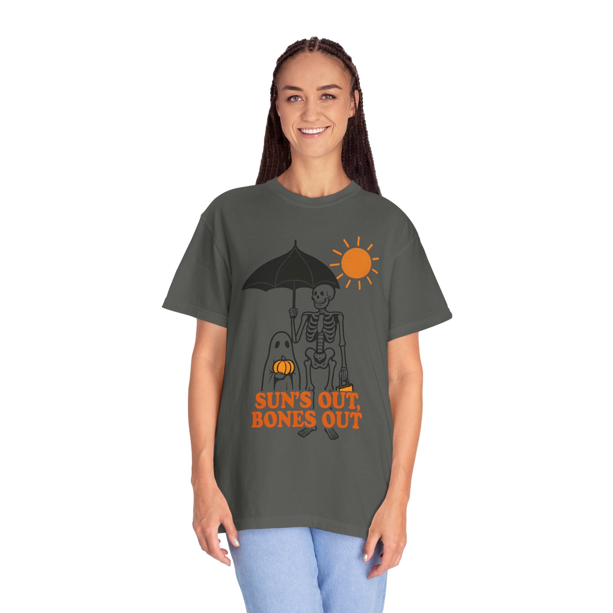 Dark gray unisex graphic tee with skeleton under umbrella, sun icon and orange headline text