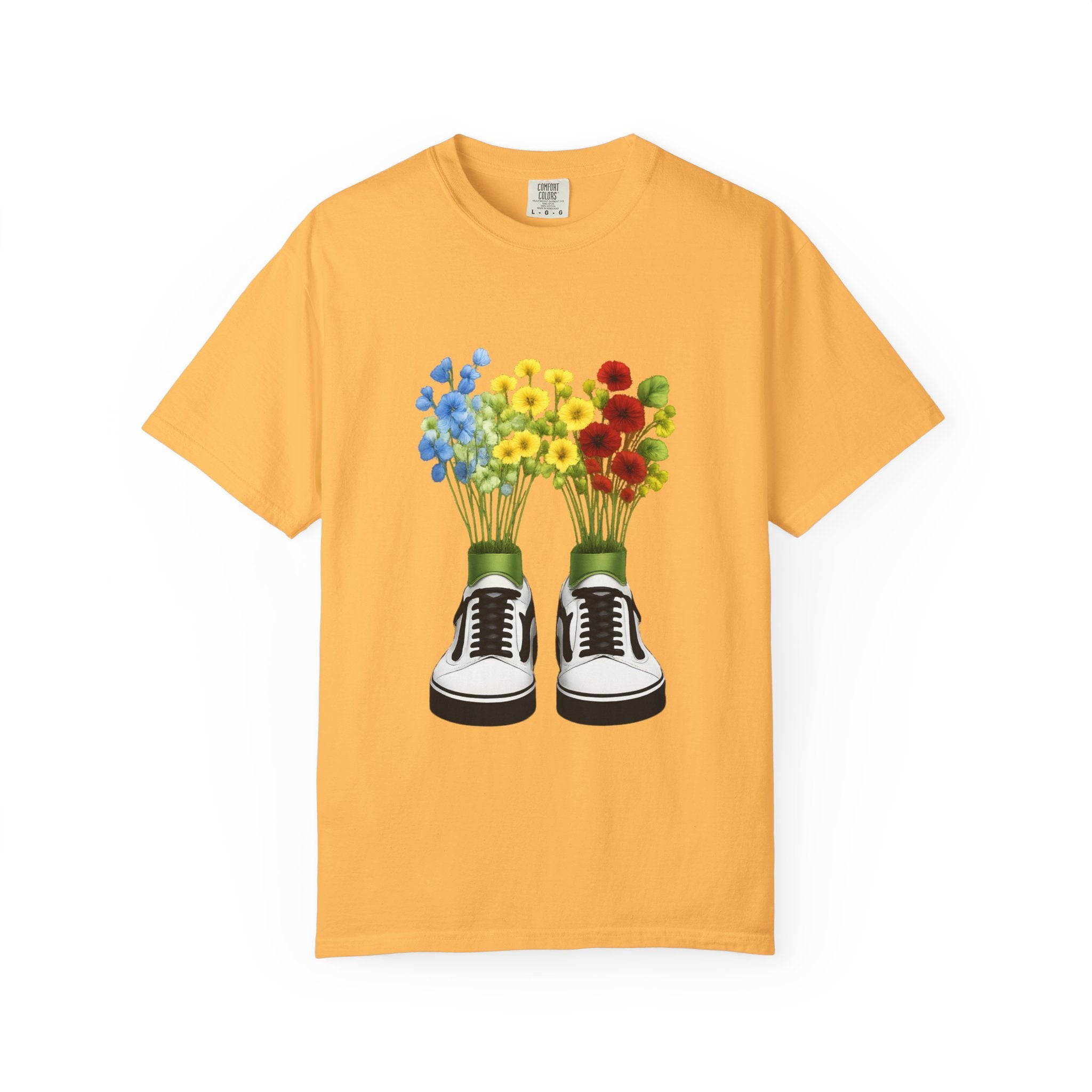 Orange T-shirt with sneaker-and-bouquet graphic centered on the front