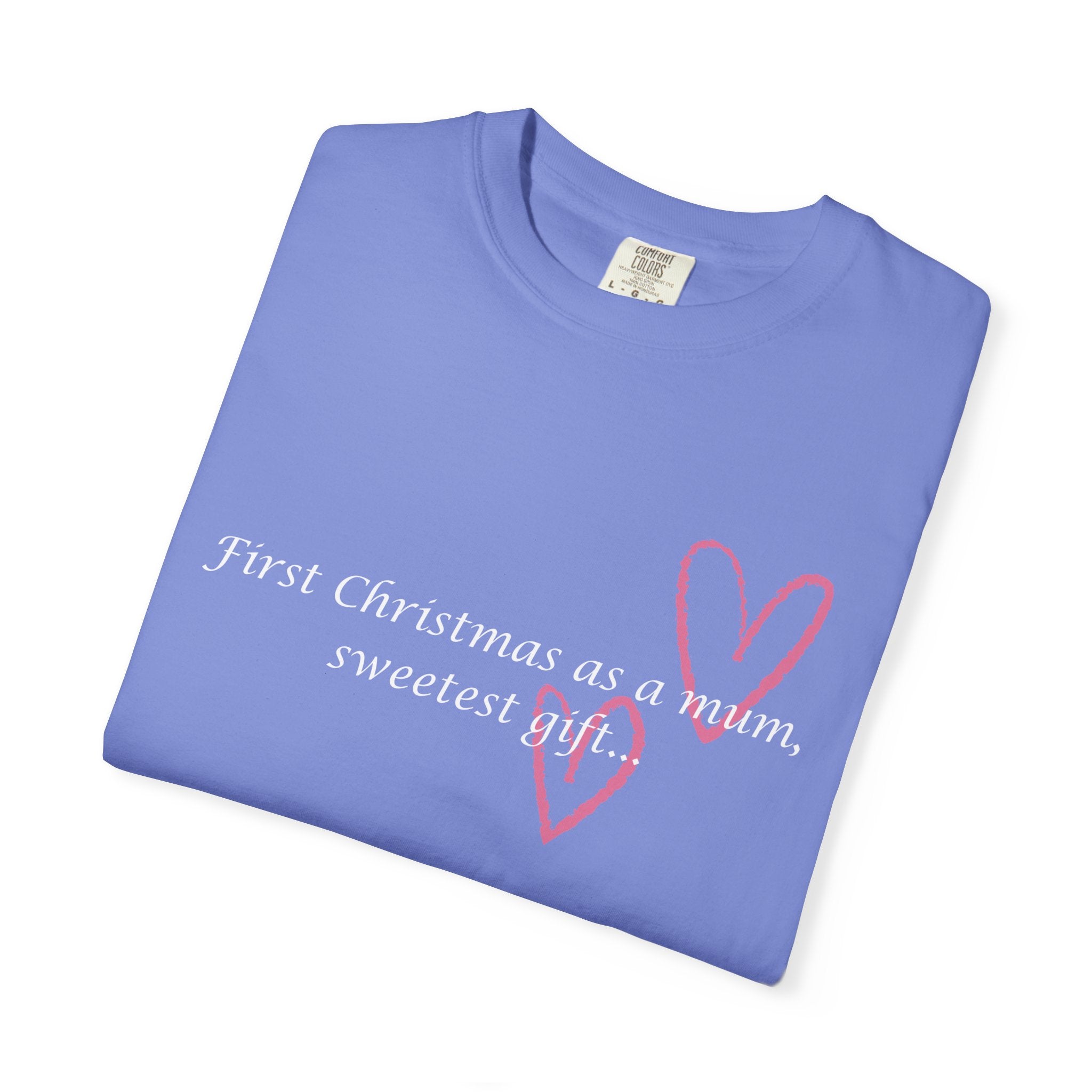 Purple crewneck T-shirt folded with pink heart graphic and 'First Christmas as a mum' text
