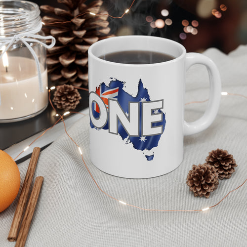 White ceramic coffee mug with 'ONE' and Australia flag map graphic, full front view.