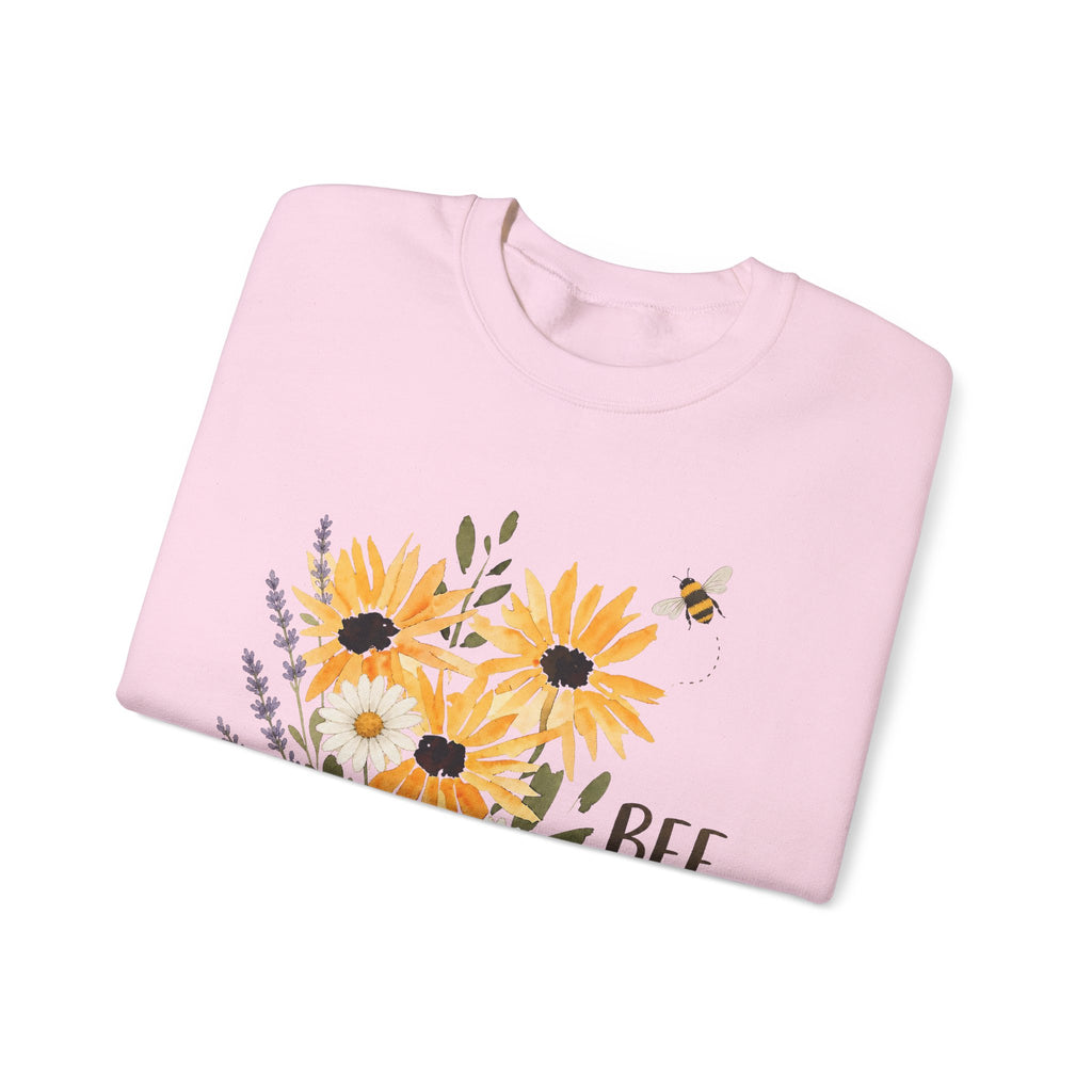 Light pink crewneck sweatshirt with sunflower bouquet and bee graphic on front
