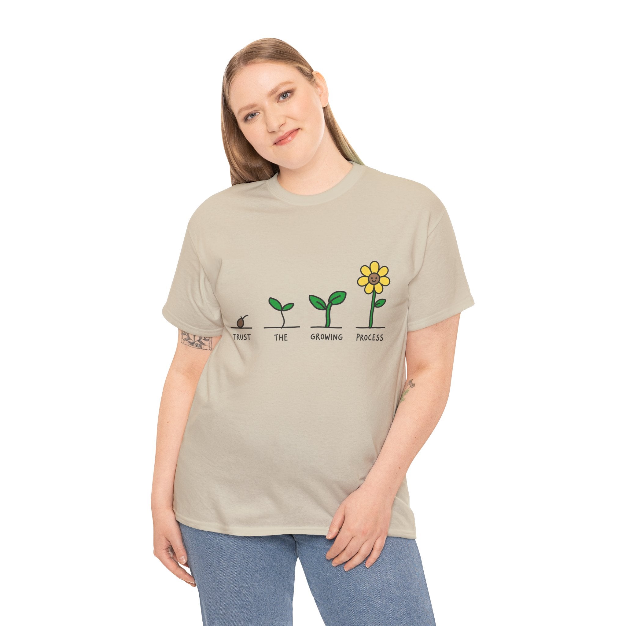 Natural beige crewneck t-shirt on model with “Trust the Growing Process” plant graphic