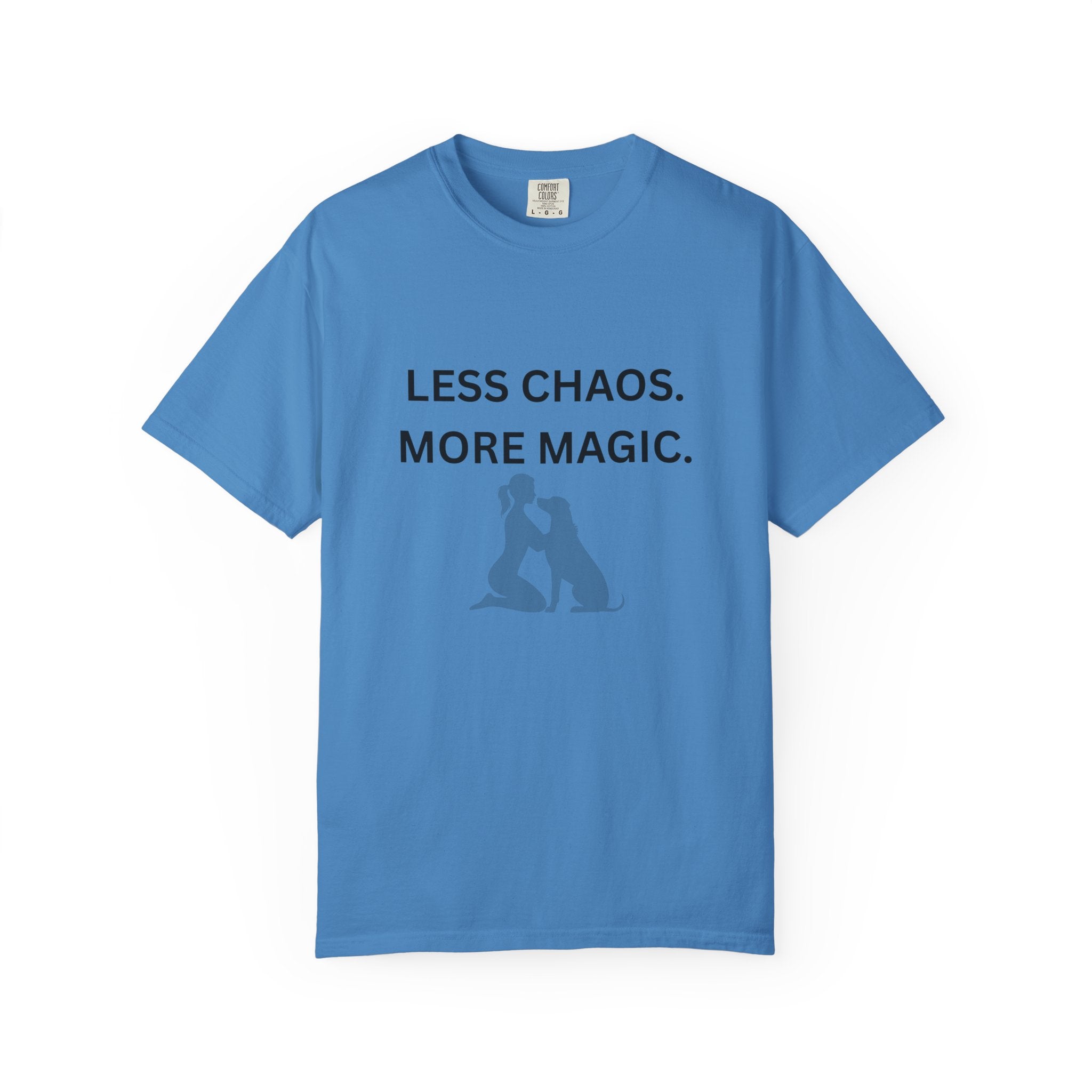 Women’s blue T-shirt with “LESS CHAOS. MORE MAGIC.” text and dog silhouette graphic