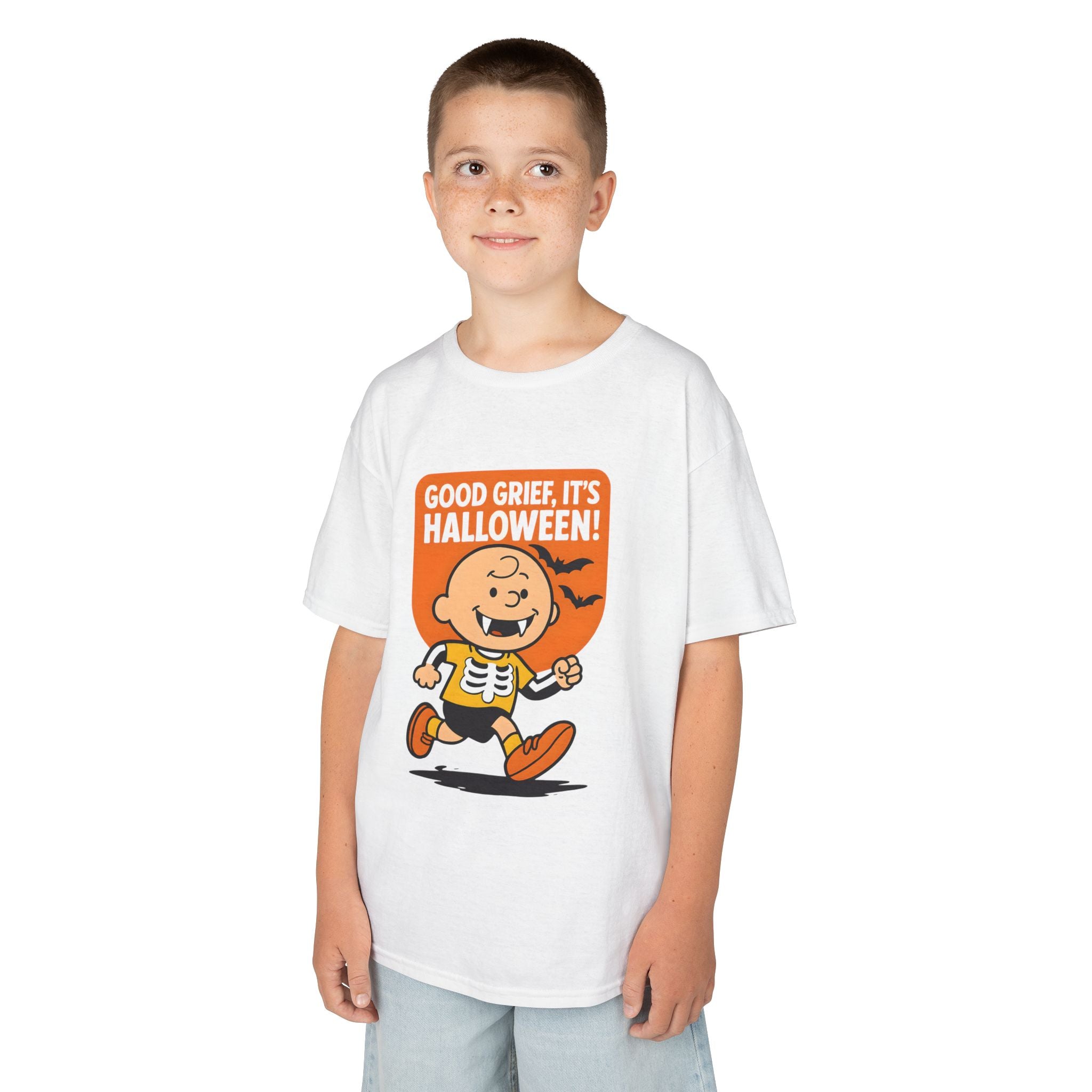 White kids Halloween T-shirt worn by child, featuring cartoon character graphic and "Good Grief, It's Halloween!"
