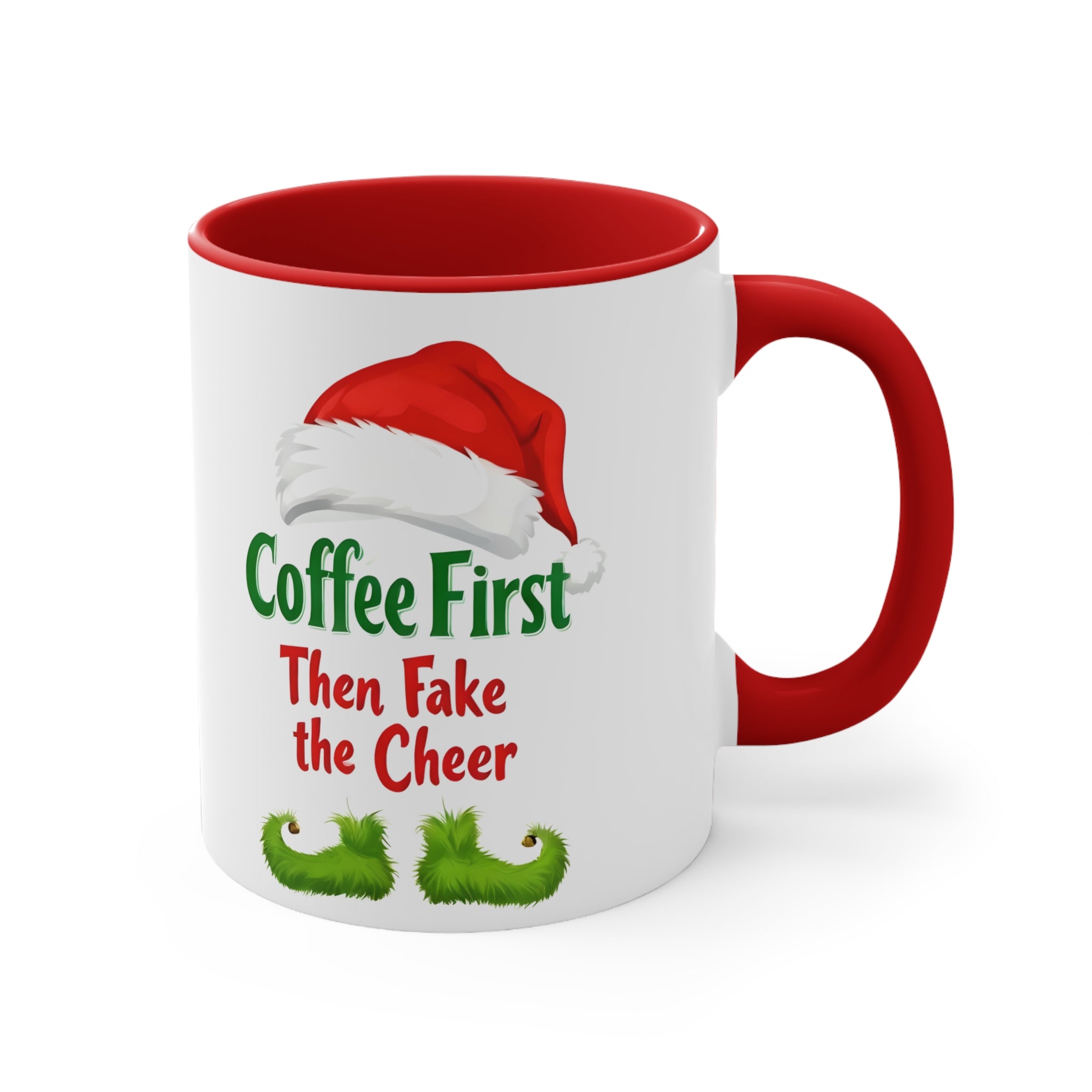 Red-handled white coffee mug with Santa hat and “Coffee First Then Fake the Cheer”