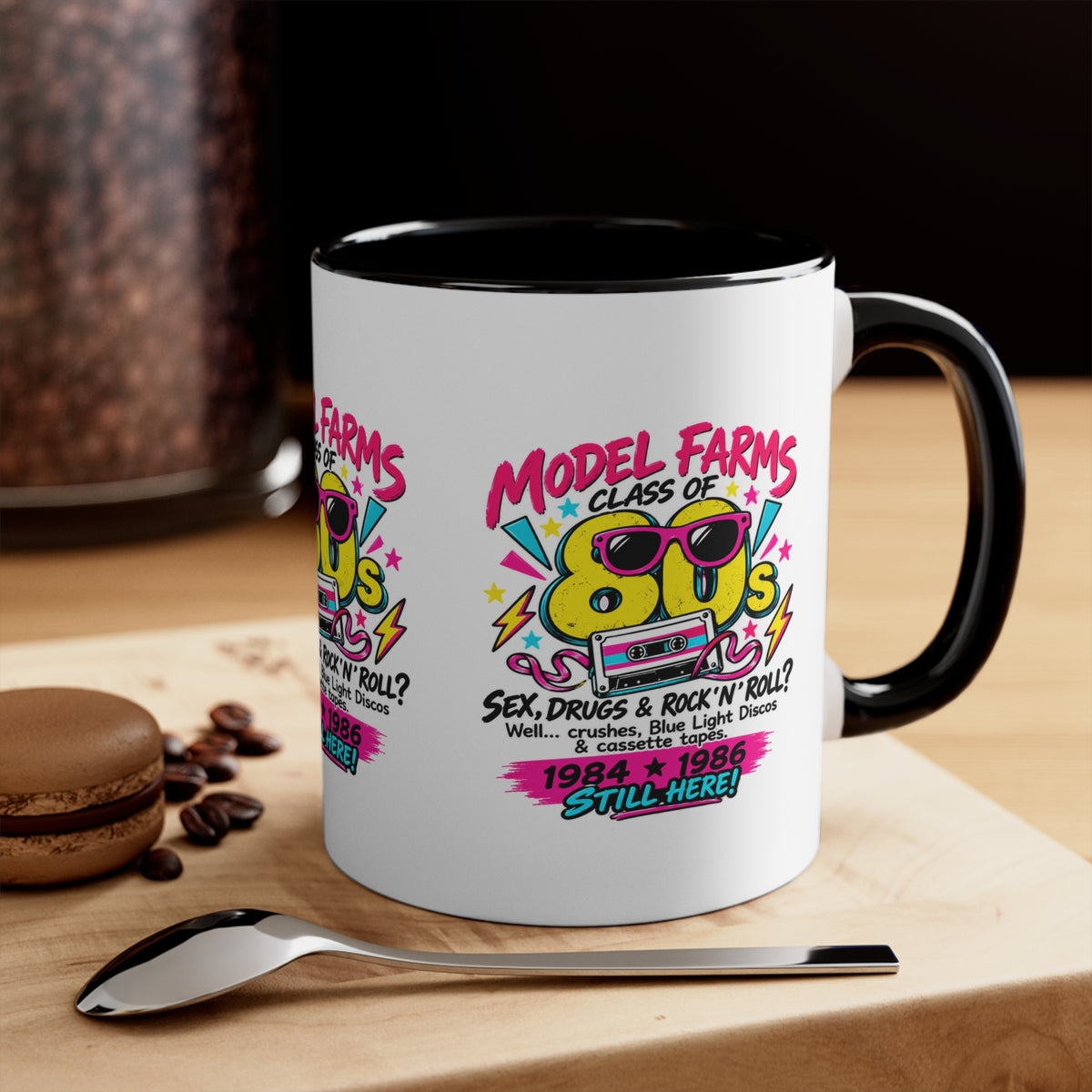 White ceramic mug with black handle and interior, retro cassette graphic