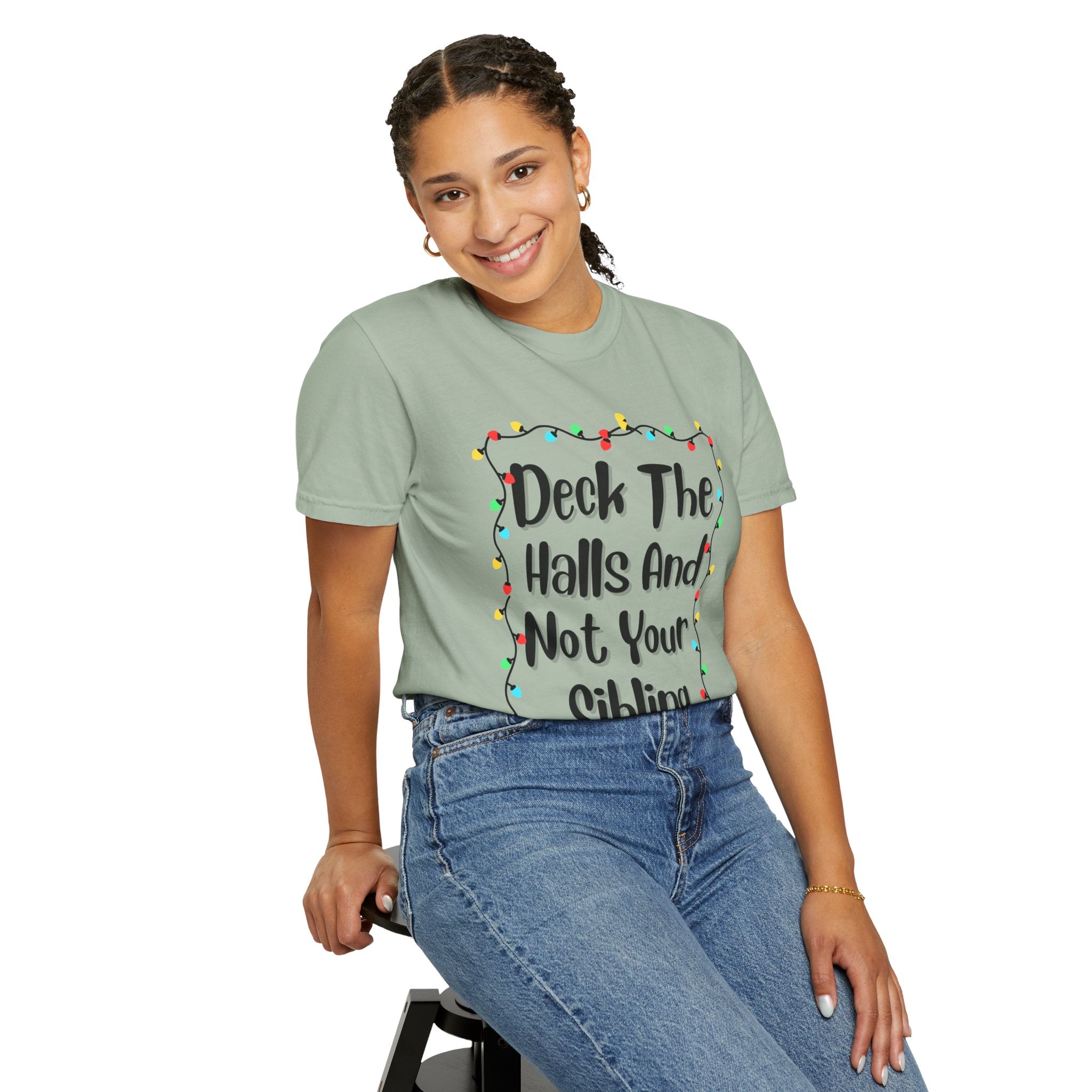 Green crewneck T-shirt worn by model with front lights graphic and slogan