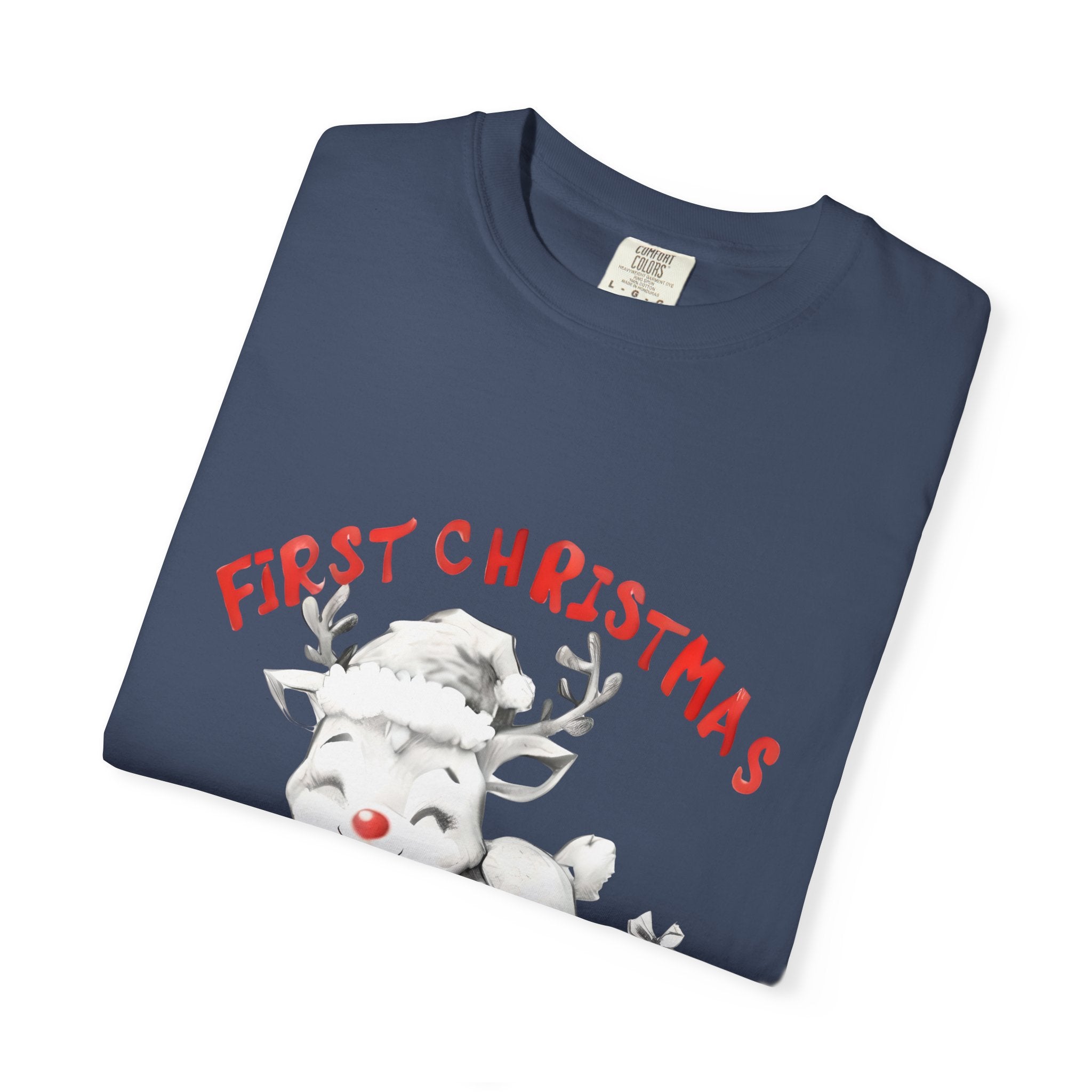 Midnight blue T-shirt, folded with reindeer graphic and “First Christmas Daddy 2025”